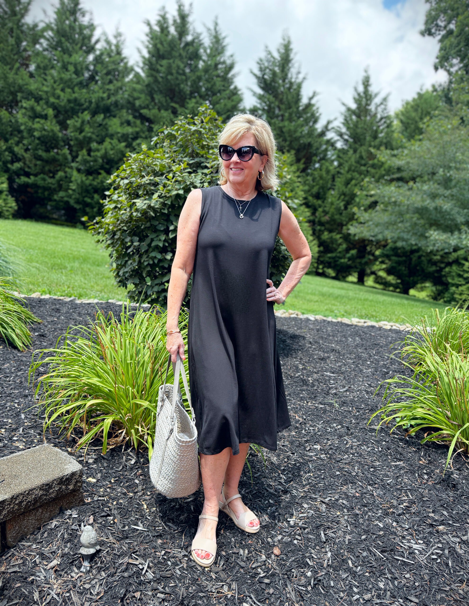 Tania wearing an Eileen Fisher black dress from Nordstrom Rack