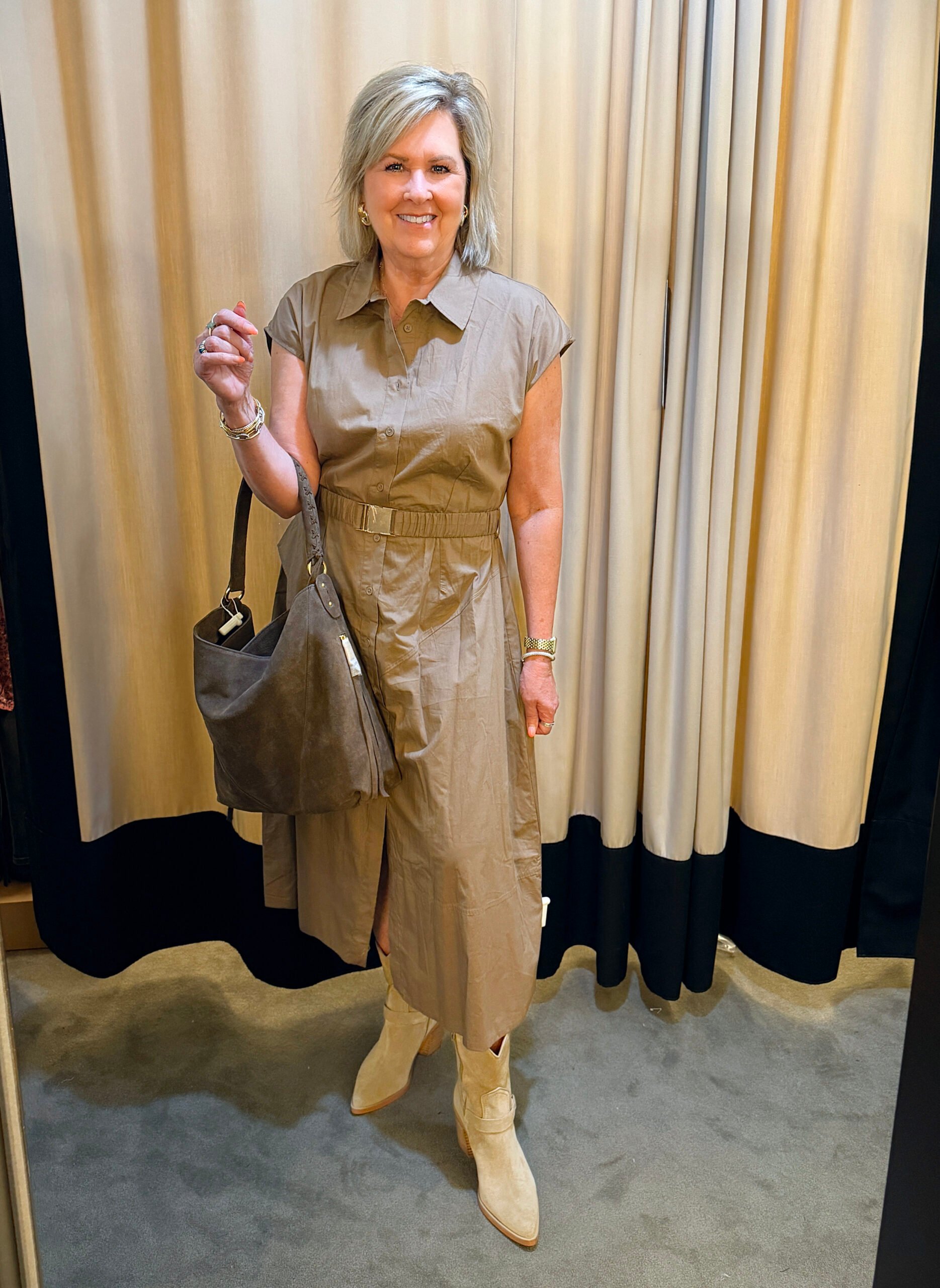 Tania wearing a brown shirtdress in front of a curtan at the Nordstrom Anniversary Sale
