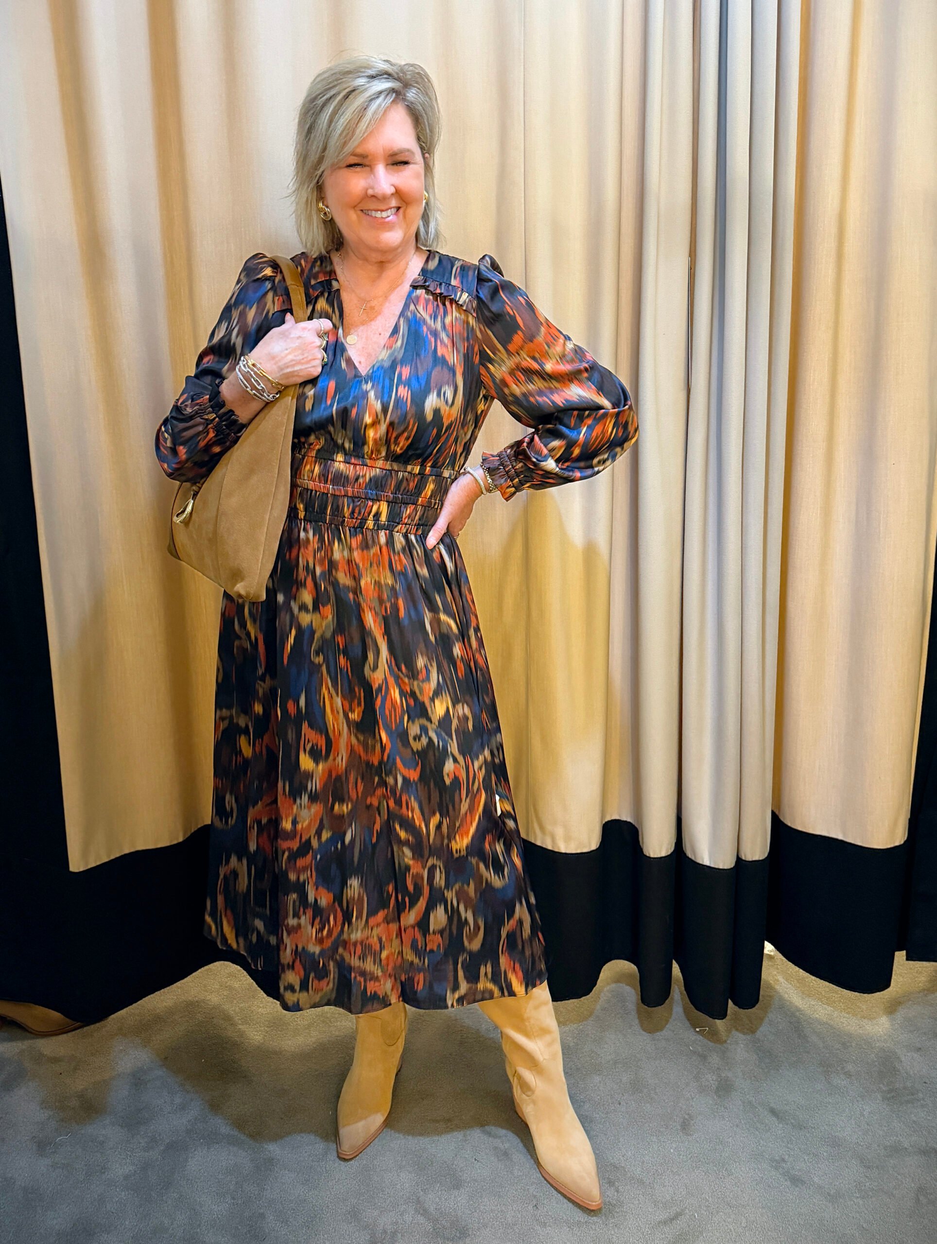 Tania wearing a floral midi dress from Nordstrom