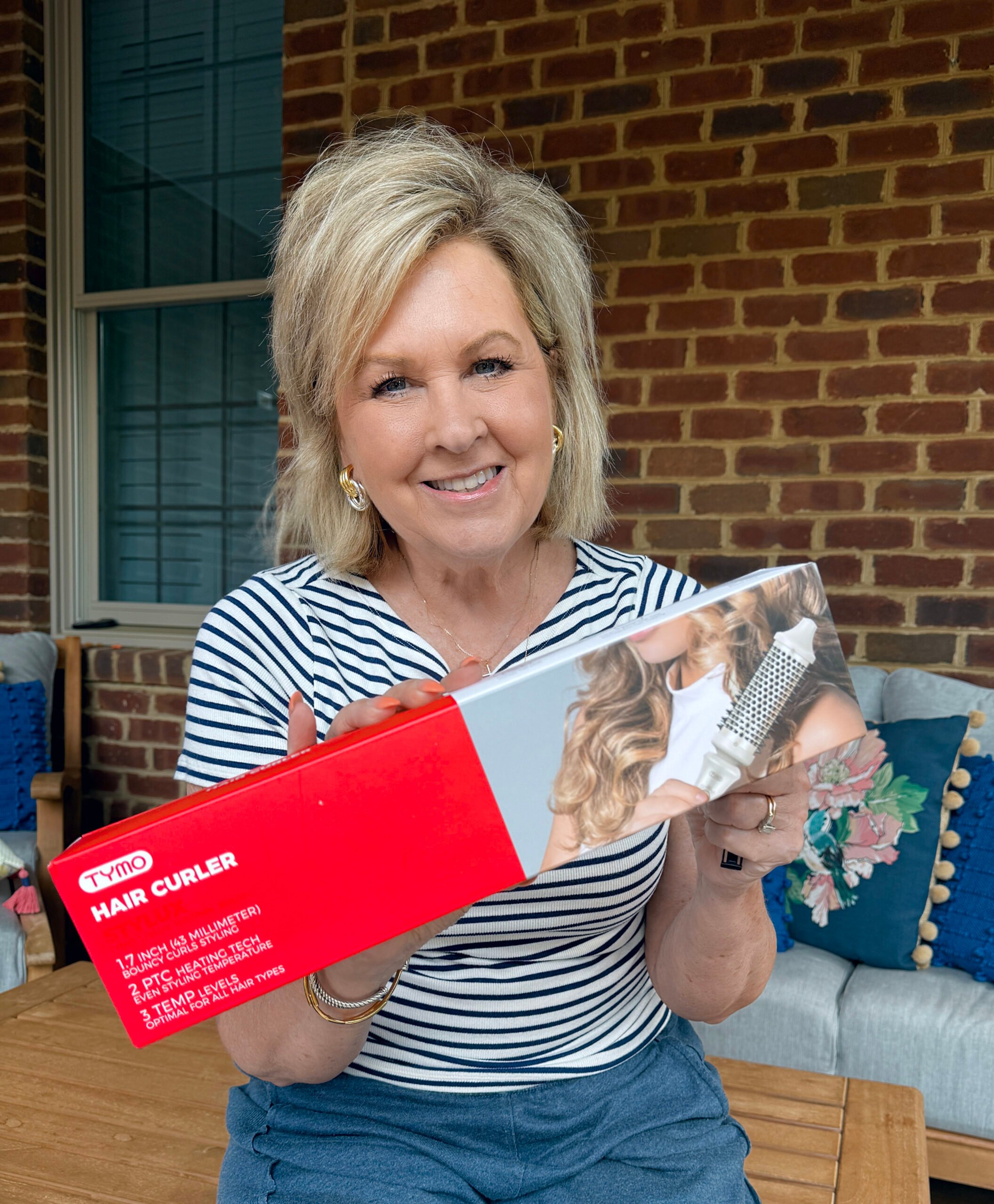 Tania Stephens showing a hair curler electric round brush from the Amazon Prime Day Sale