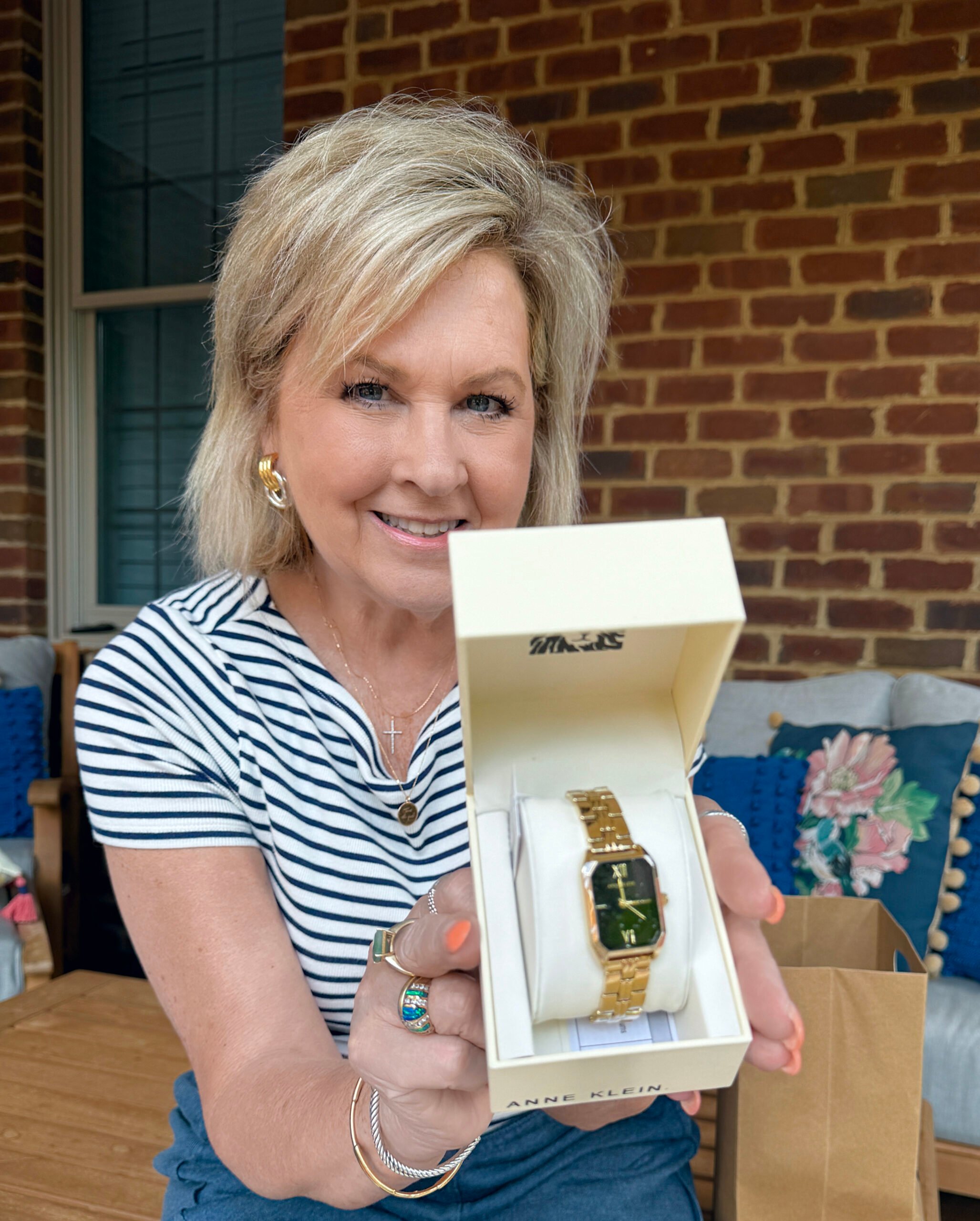 Tania Stephens holding an Anne Klein watch from the Amazon Prime Day Sale