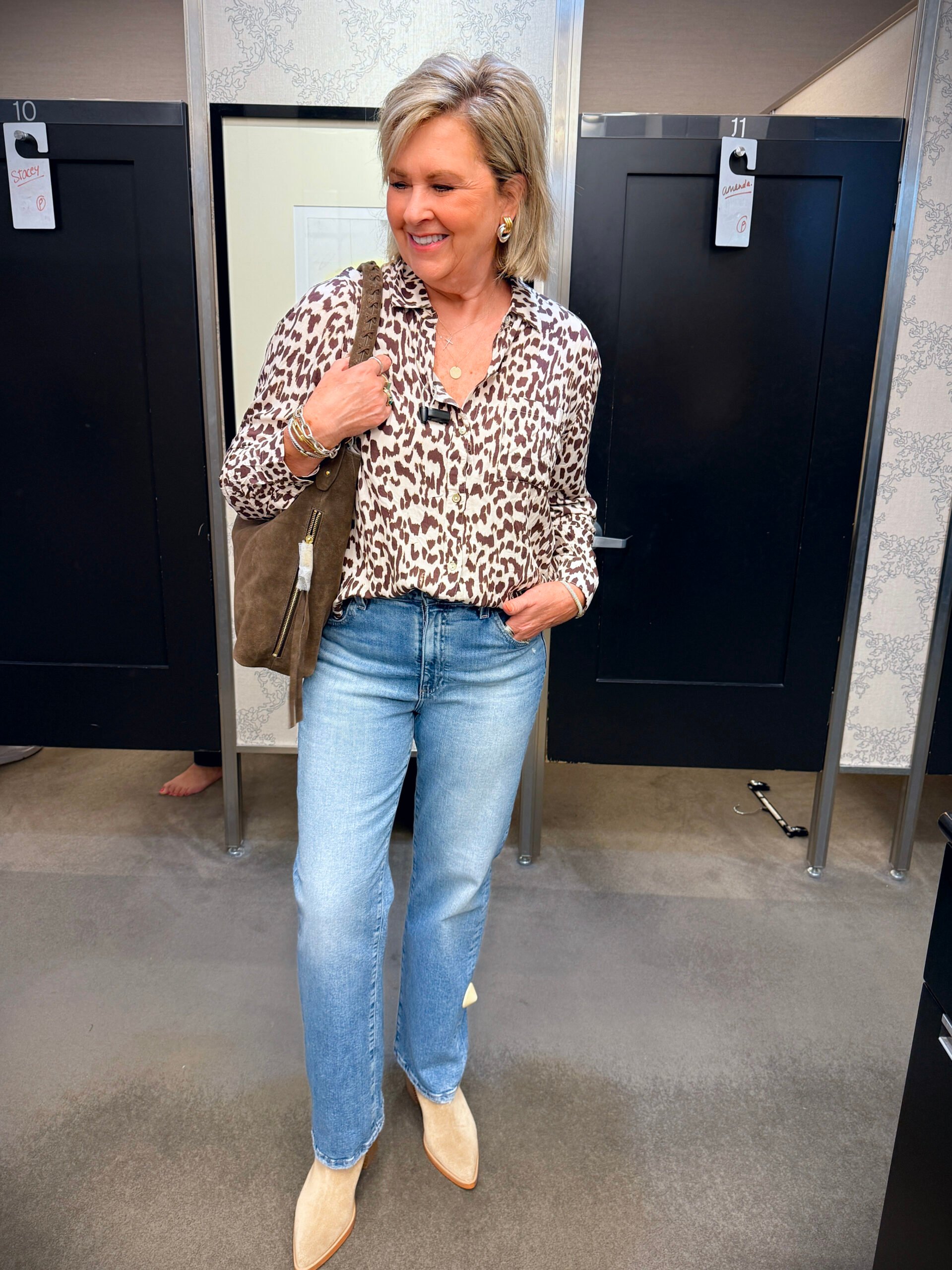 Tania wearing a printed top, and jeans from the Nordstrom Anniversary Sale