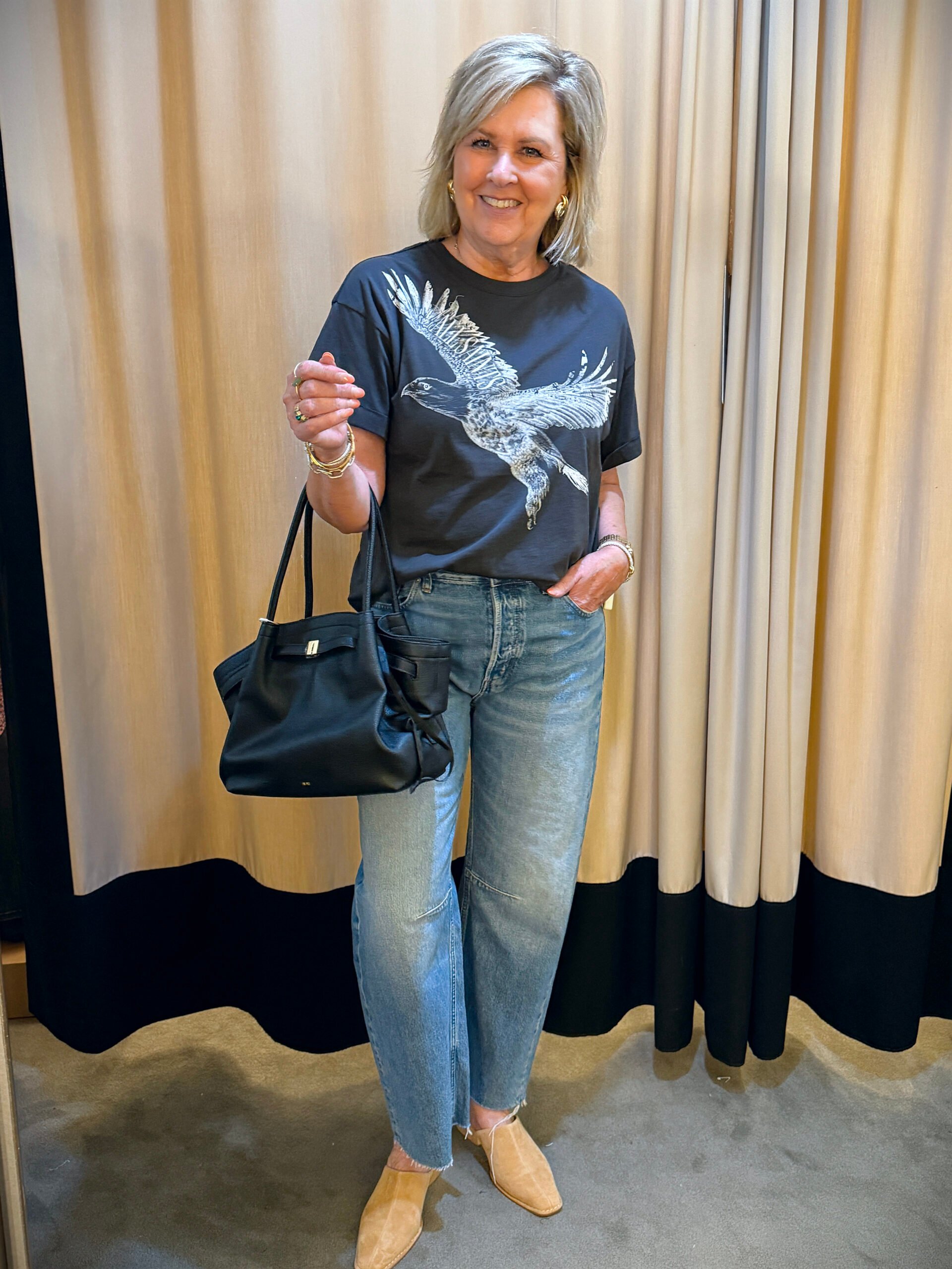 Tania wearing a hawk tee with jeans from Nordstrom