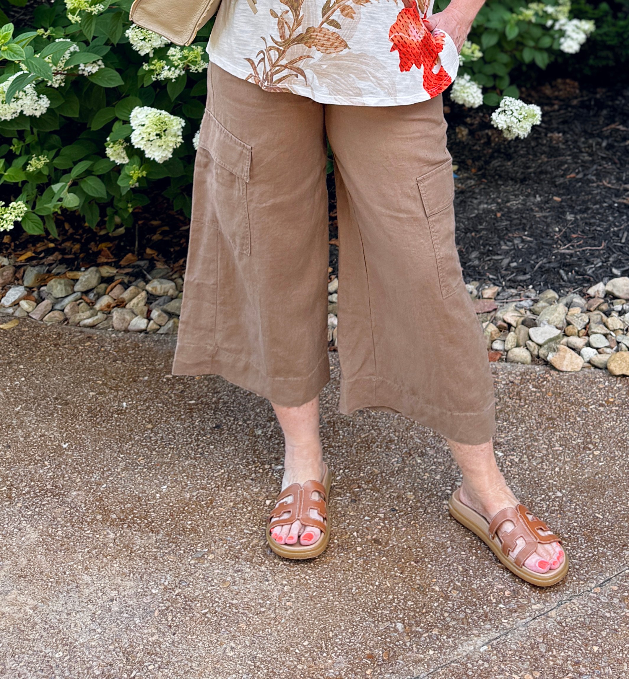 Tania wearing brown cropped cargo pants