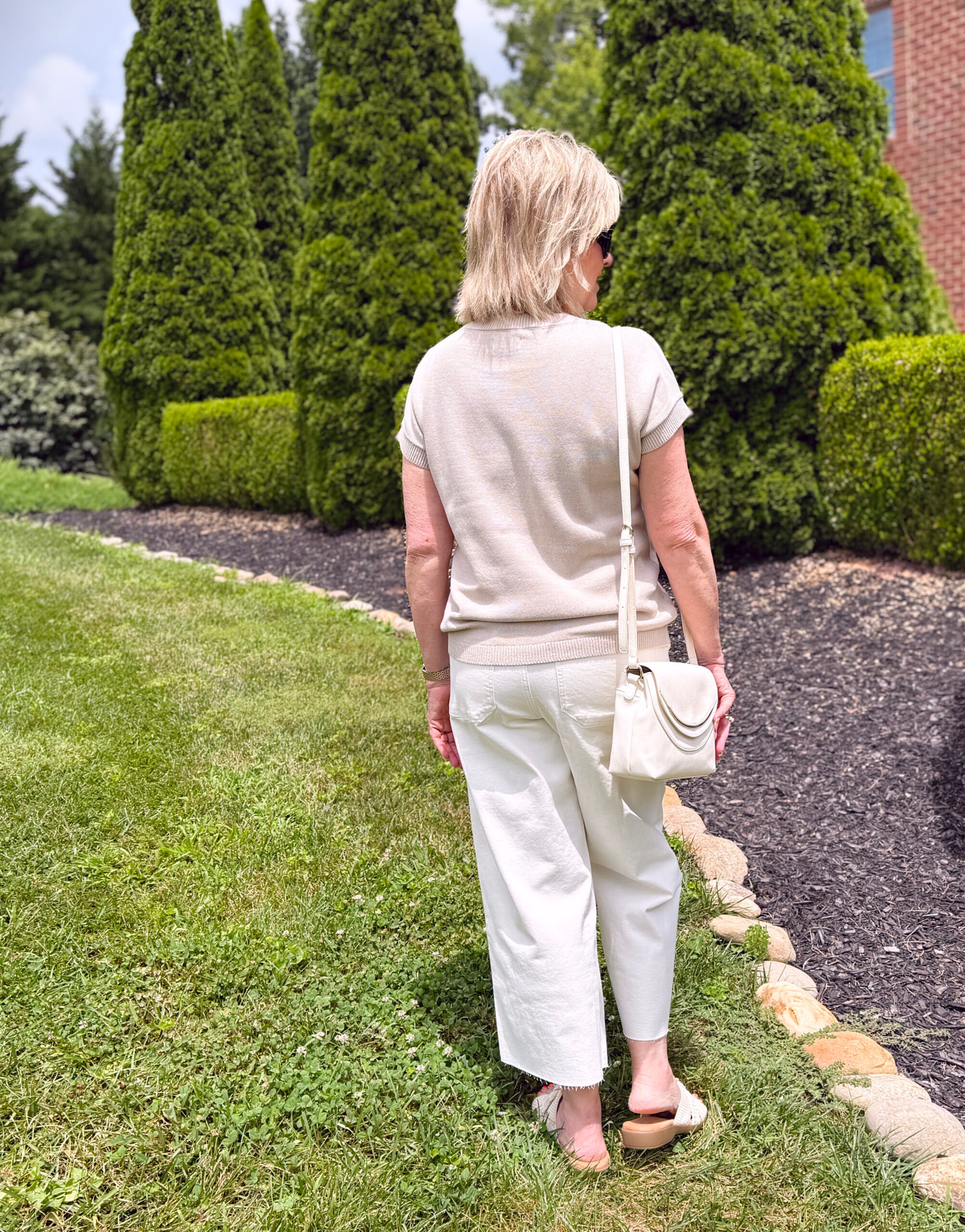 Tania Stephens showing the back of a neutral summer outfit from Kohls