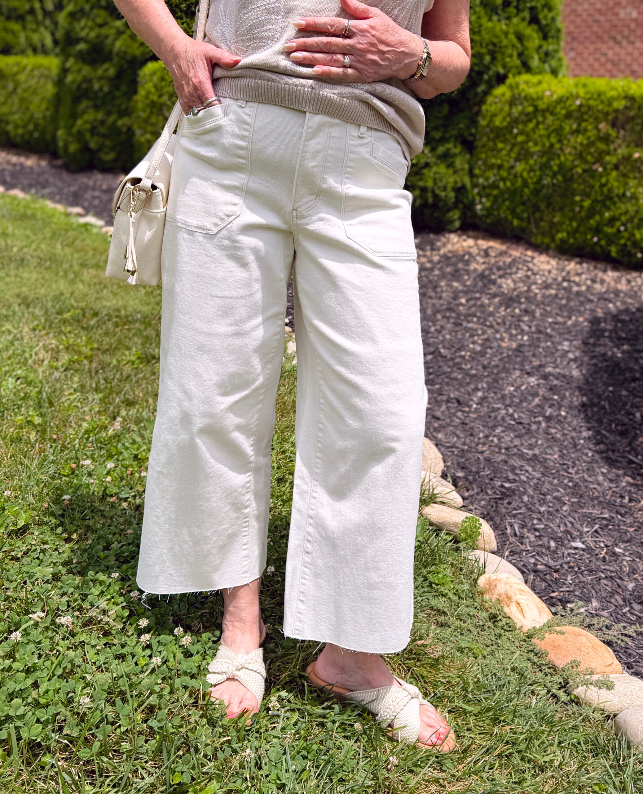 Tania Stephens wearing a neutral pair of cropped pants from Kohls