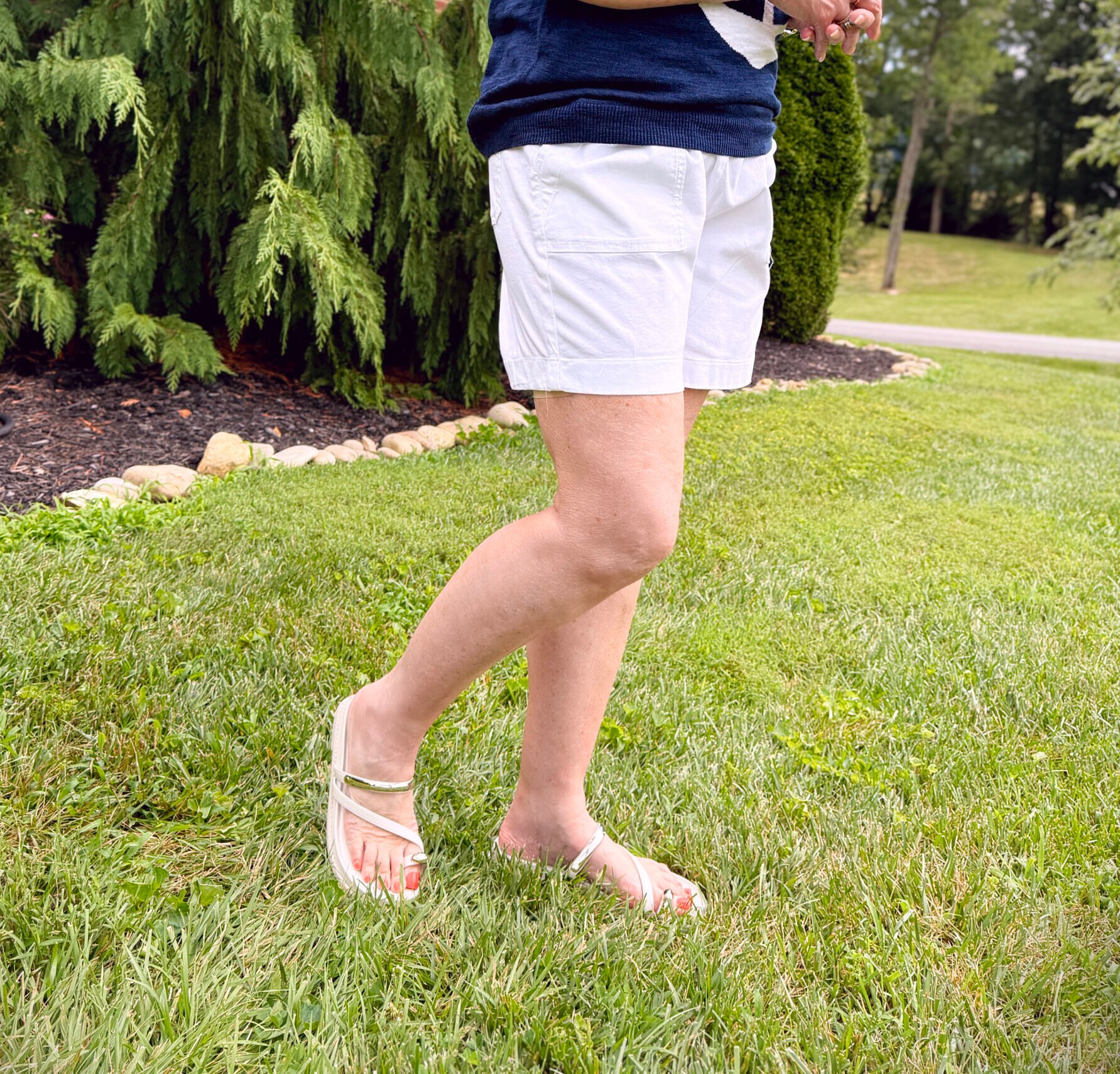 Tania Stephens wearing a pair of white shorts with sandals from Kohls