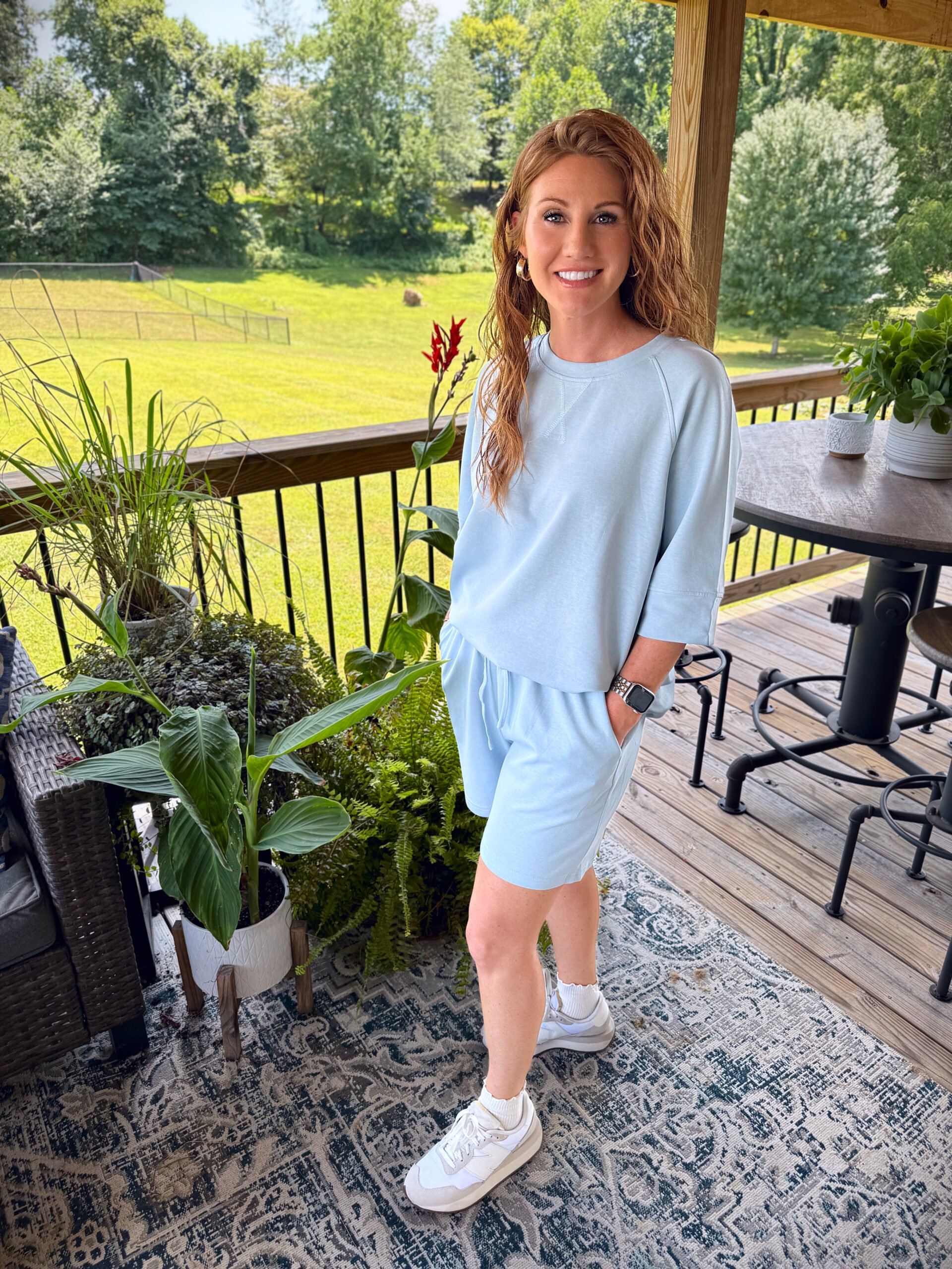 Stephanie, a petite 5'3" tall, wearing a light blue short set from Amazon