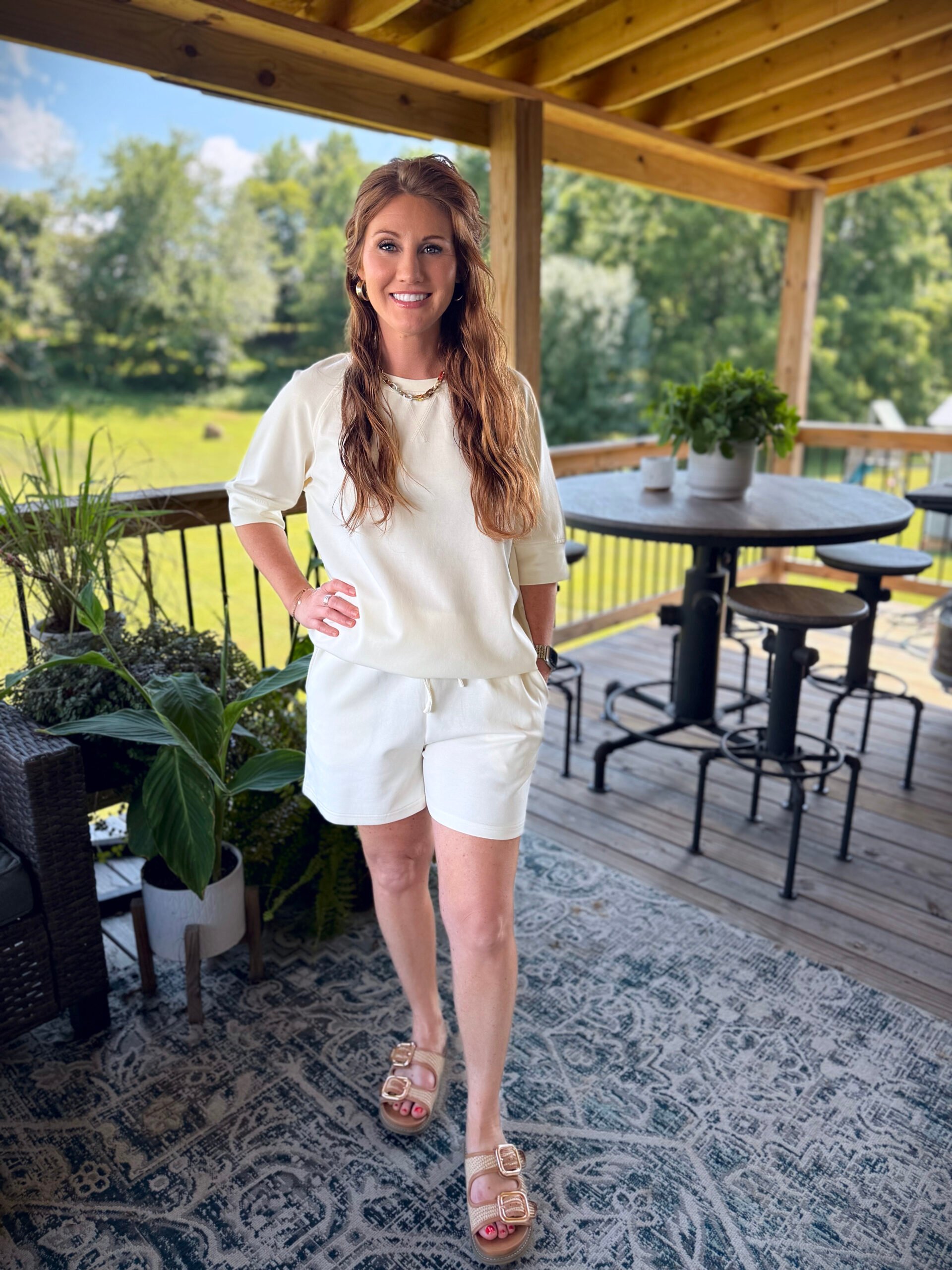 Stephanie, a petite 5'3" tall, wearing a cream short set from Amazon