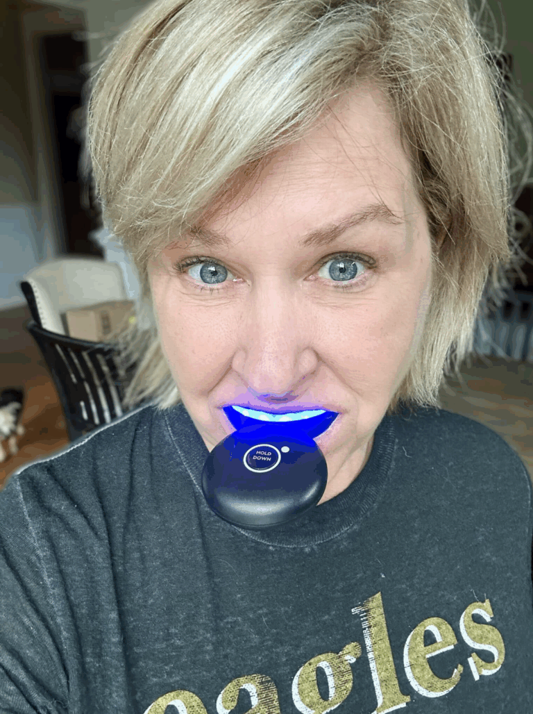 Tania using the MOON teeth whitening devise