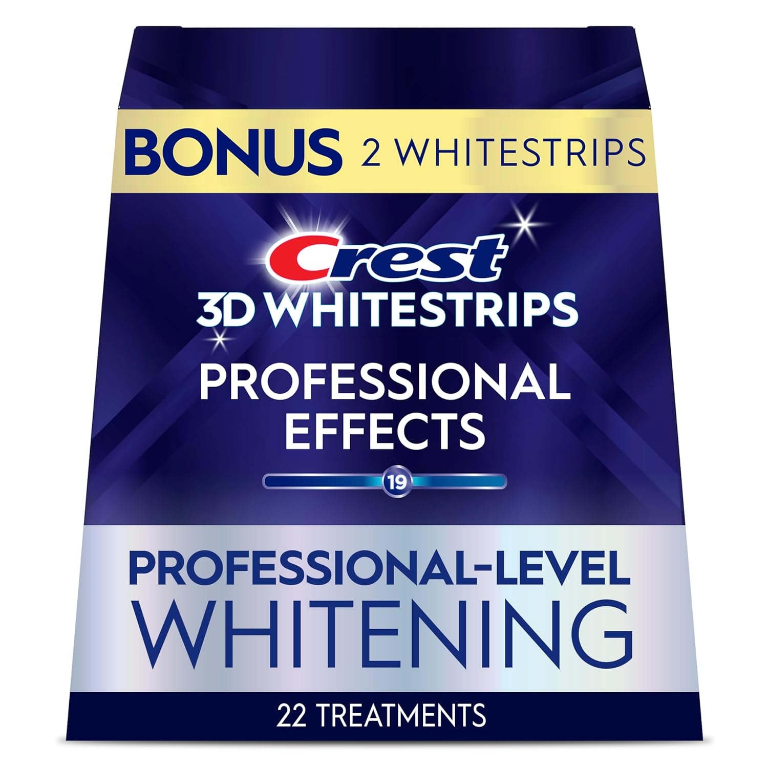 Crest 3D Whitestrips box and strips laid out with toothbrush