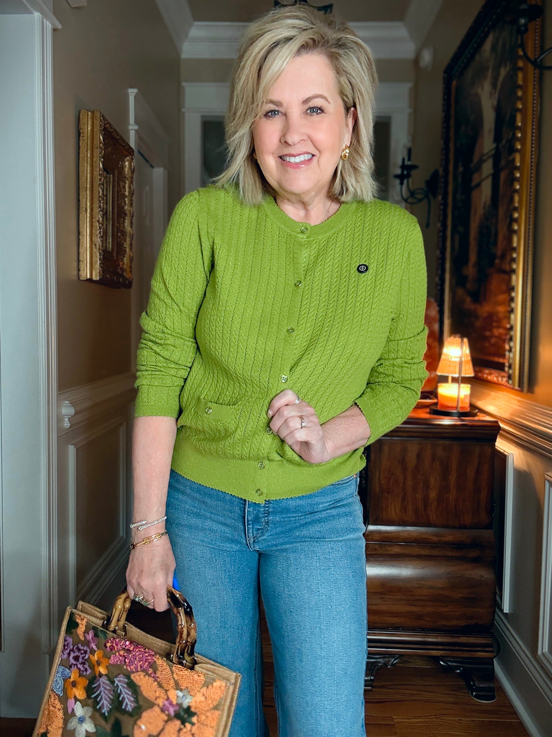 Tania is a green sweater from Walmart
