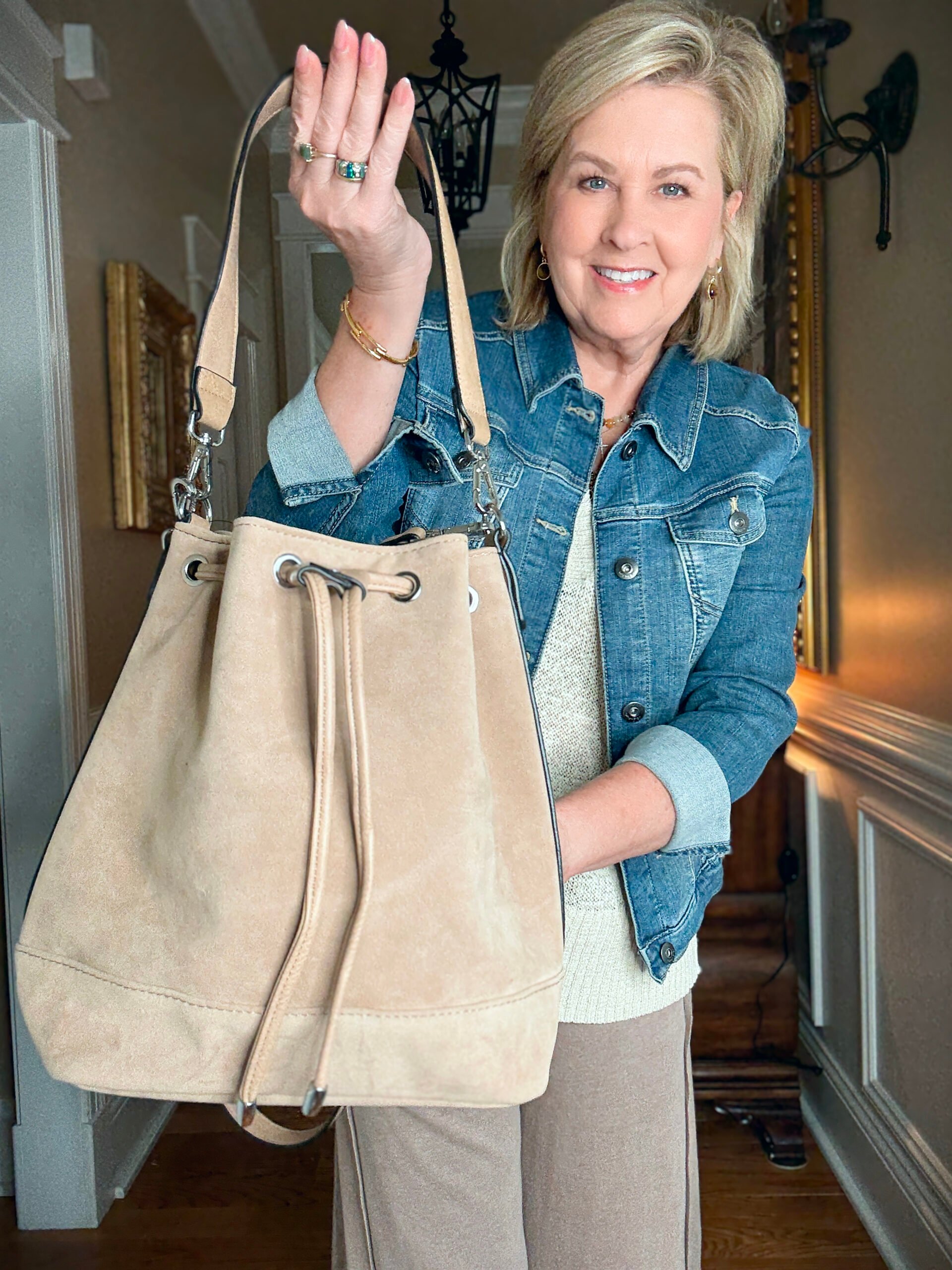 Tania is showing how to do a Summer to fall transition with ja faux suede bag