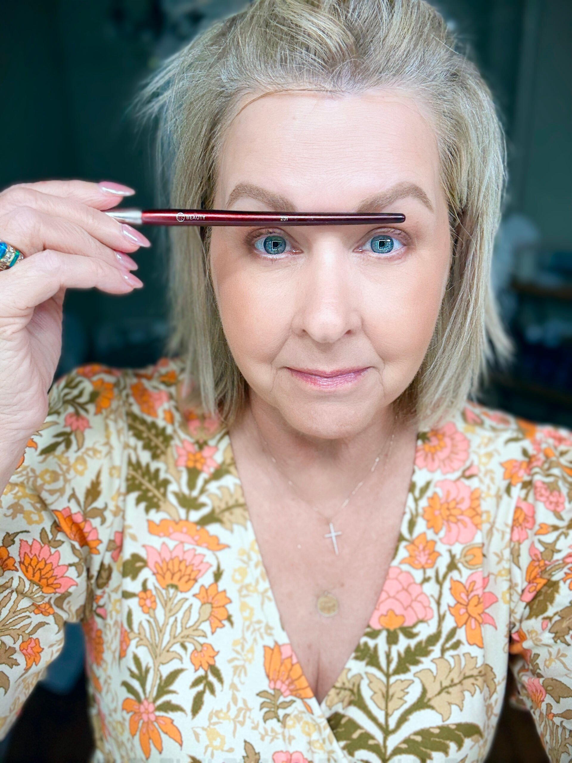 Tania showing the steps for creating the correct eyebrow shape #1