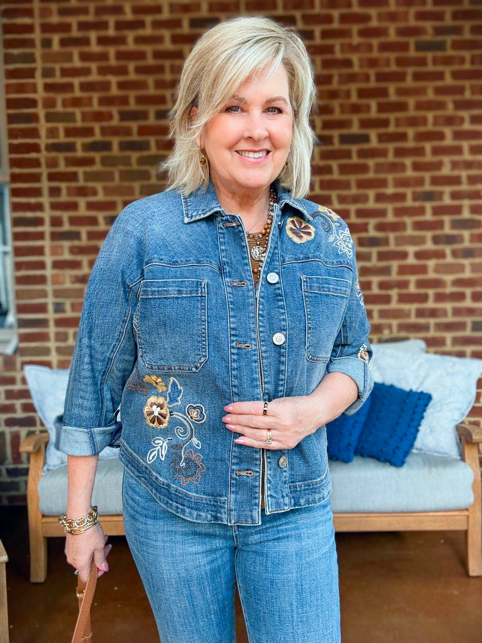 Tania Stephens wearing fall styles from Chico's - a denim jacket with embroidery