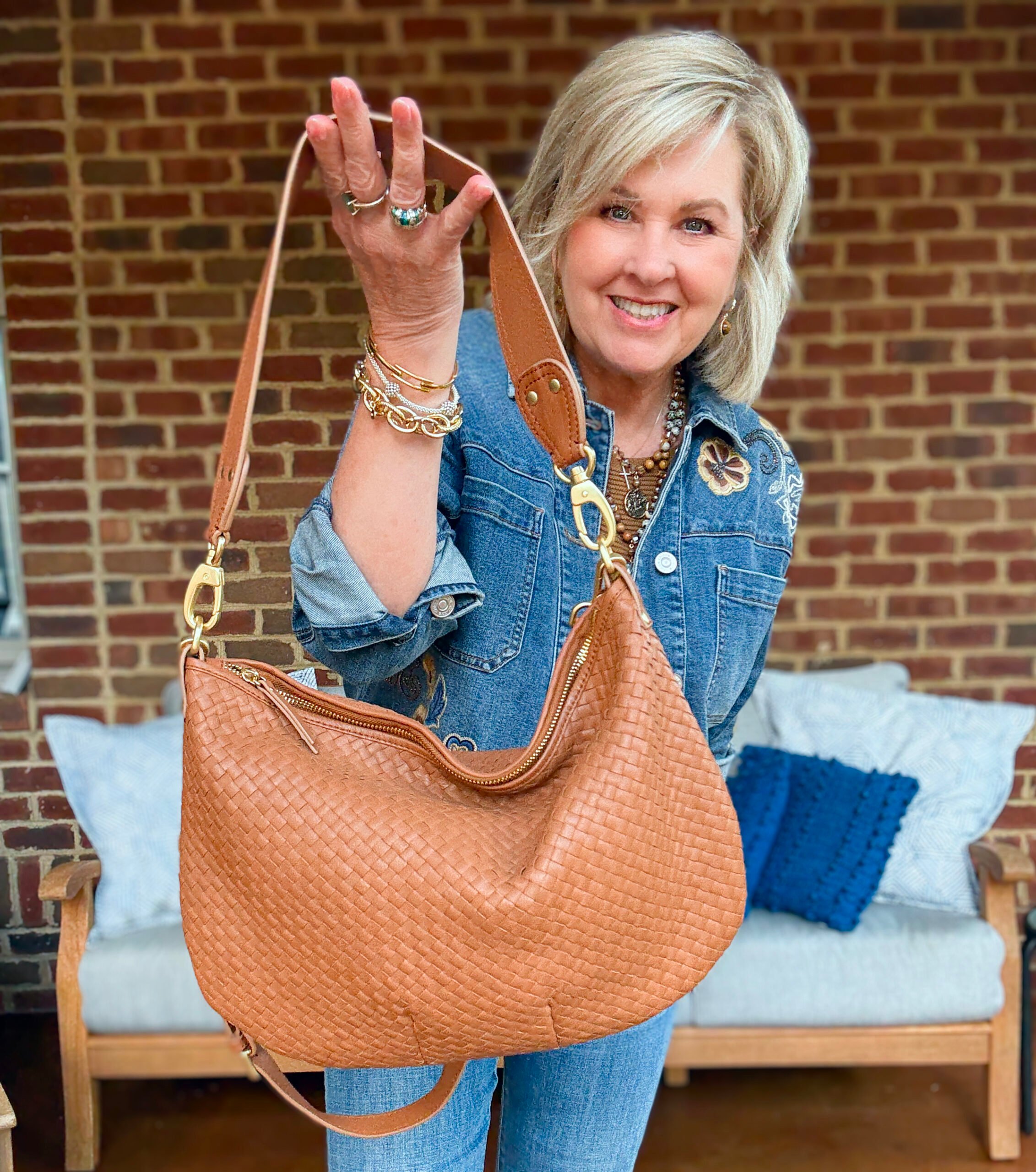 Tania Stephens wearing fall styles from Chico's - a  woven handbag