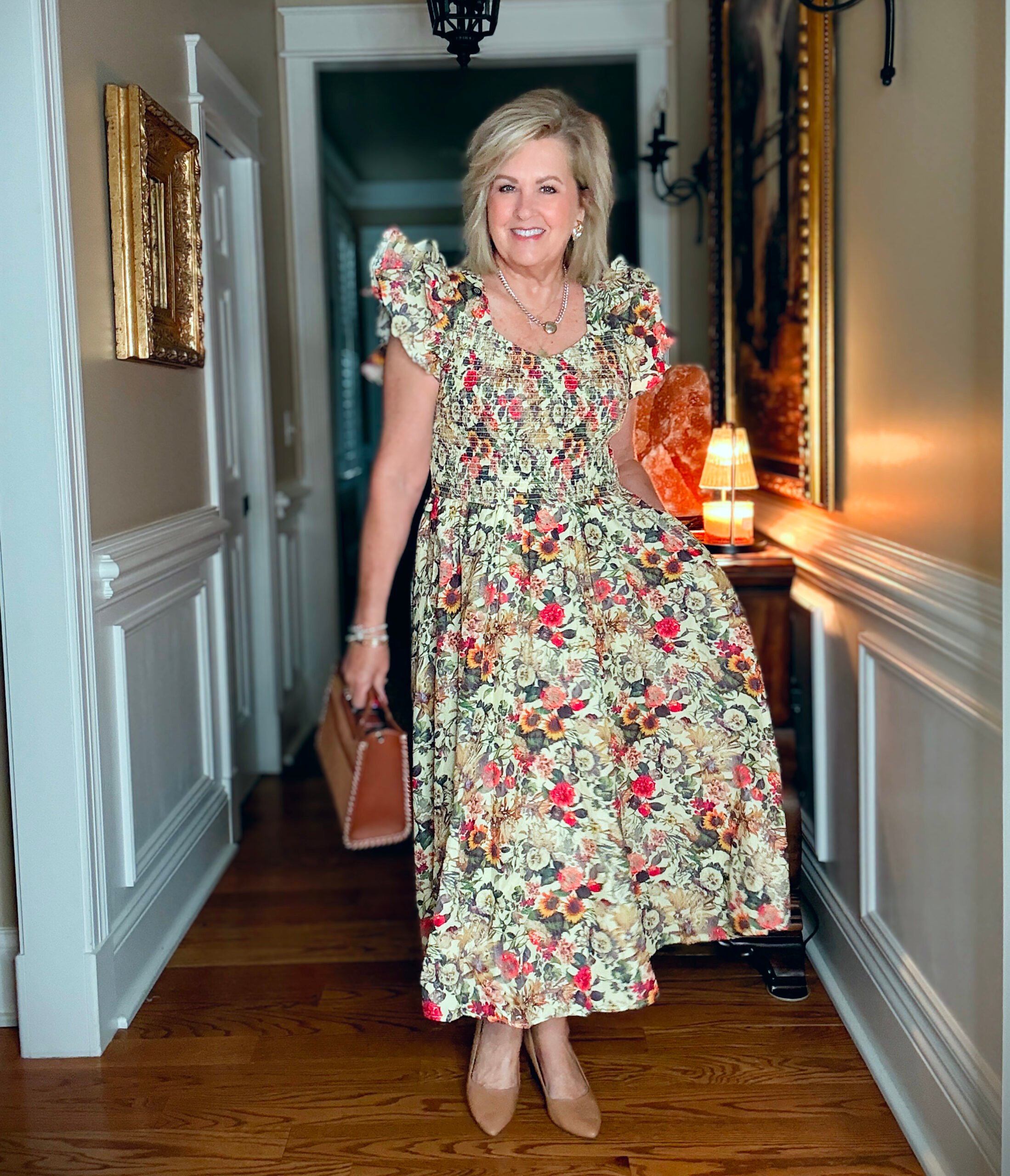 Tania wearing a V-Neck floral midi dress from Ivy City