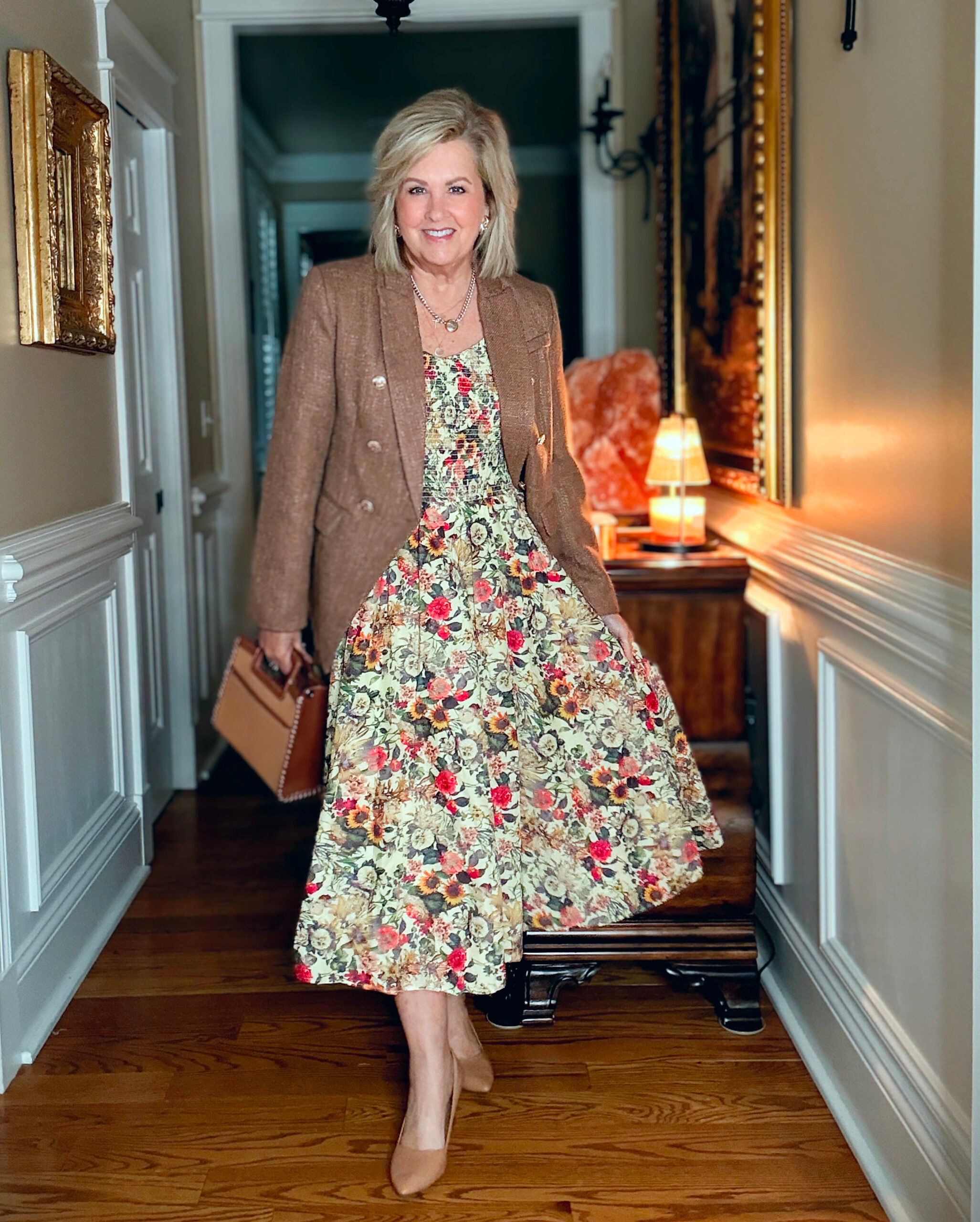 Tania wearing a V-Neck floral midi dress from Ivy City with a brown tweed blazer
