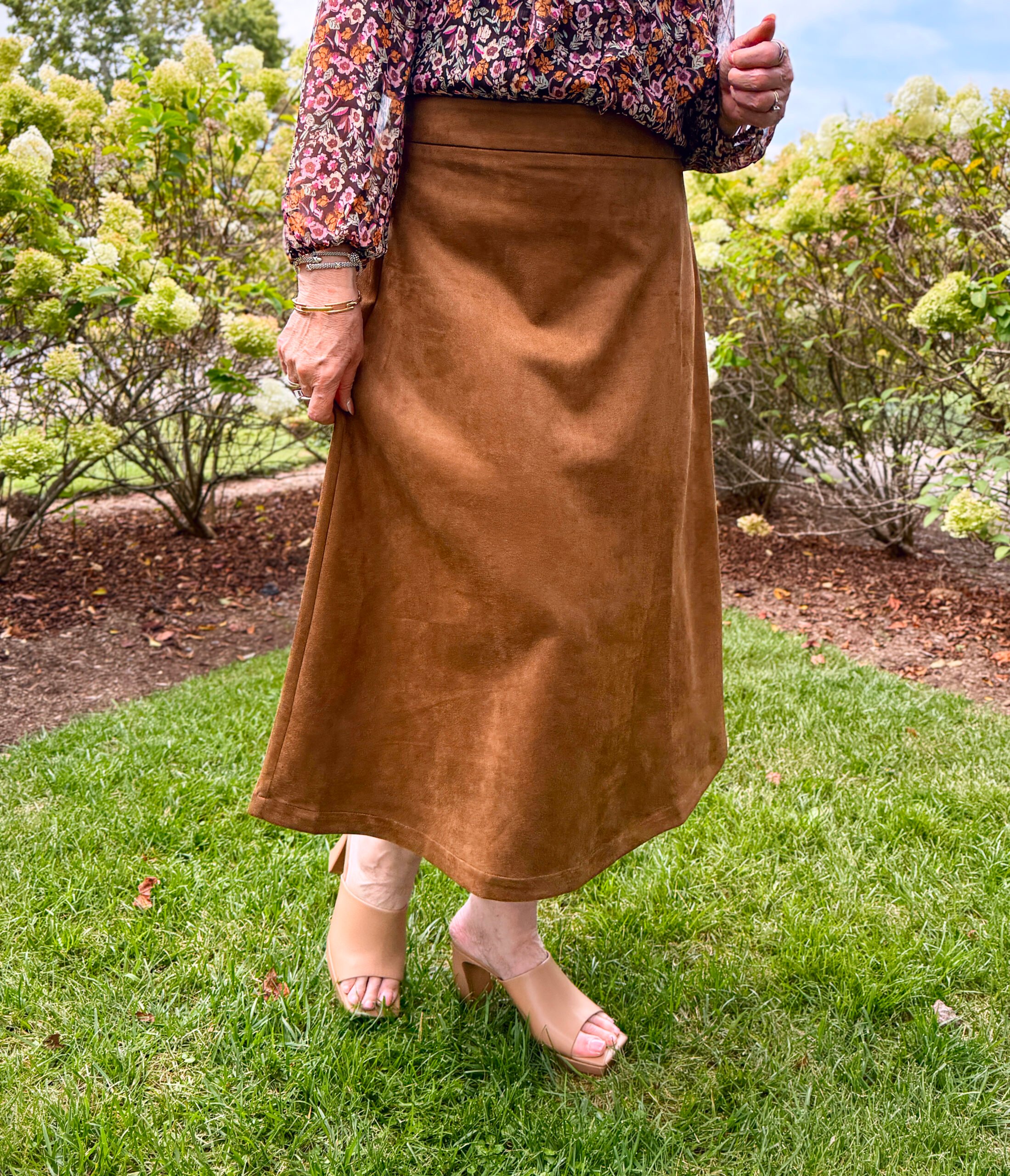 Tania Stephens wearing a faux suede skirt for fall from Kohl's