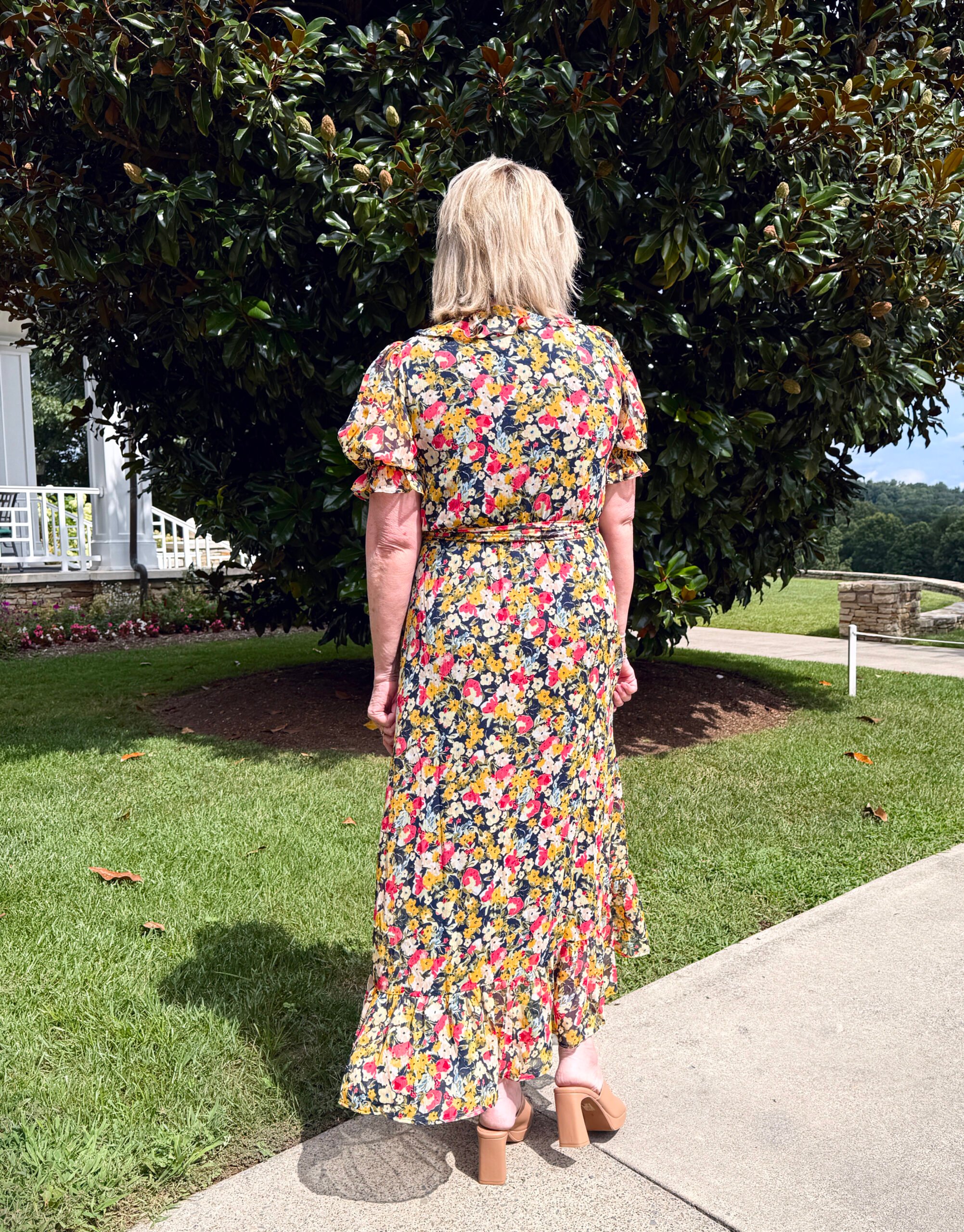 Tania Stephens showing the back of a  gorgeous fall maxi dress for fall from Kohl's