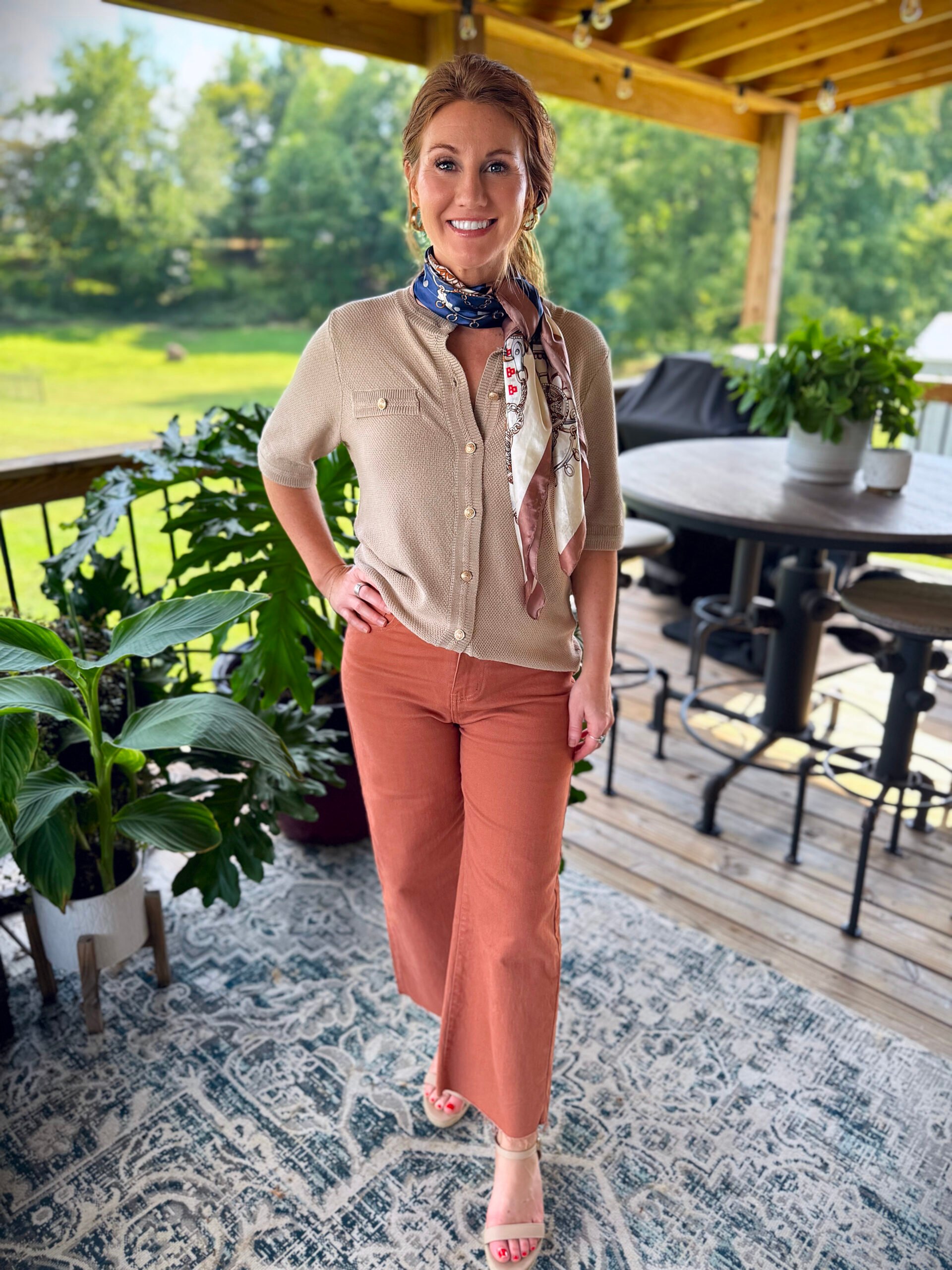 Stephanie wearing a sweater from Amazon with scarf