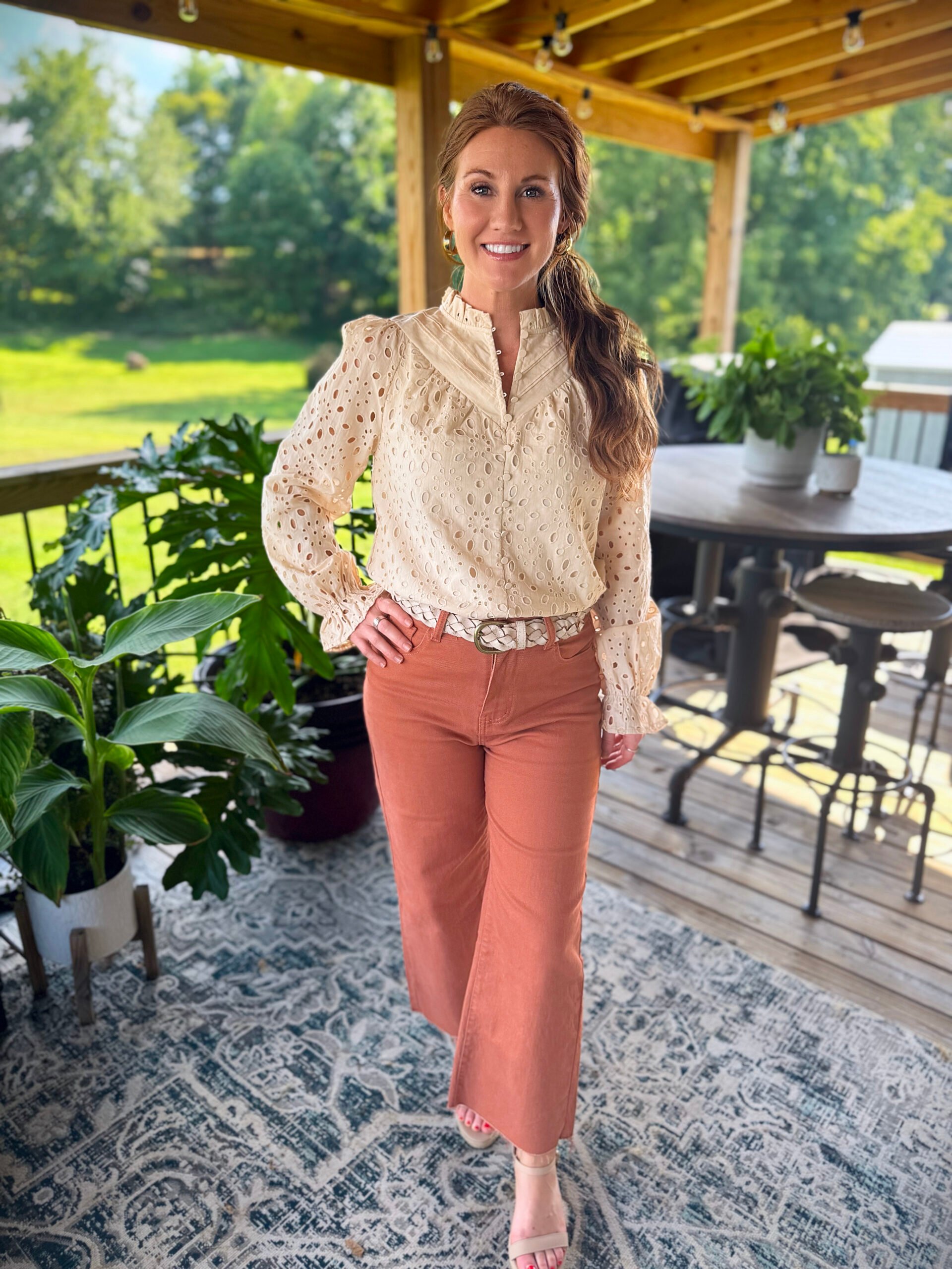 Stephanie wearing an eyelet beige button up shirt from Amazon 