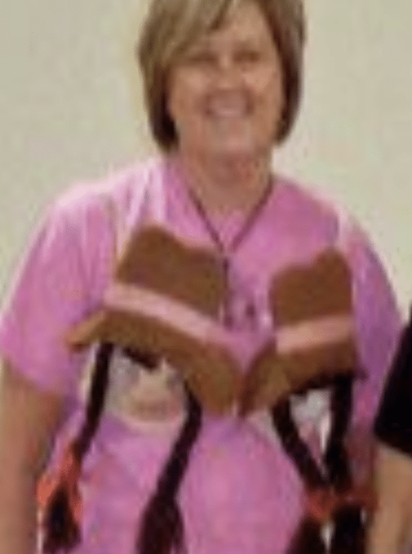 Tania participating in a Bras for a Cause event in her decorate bra of the "gurls."