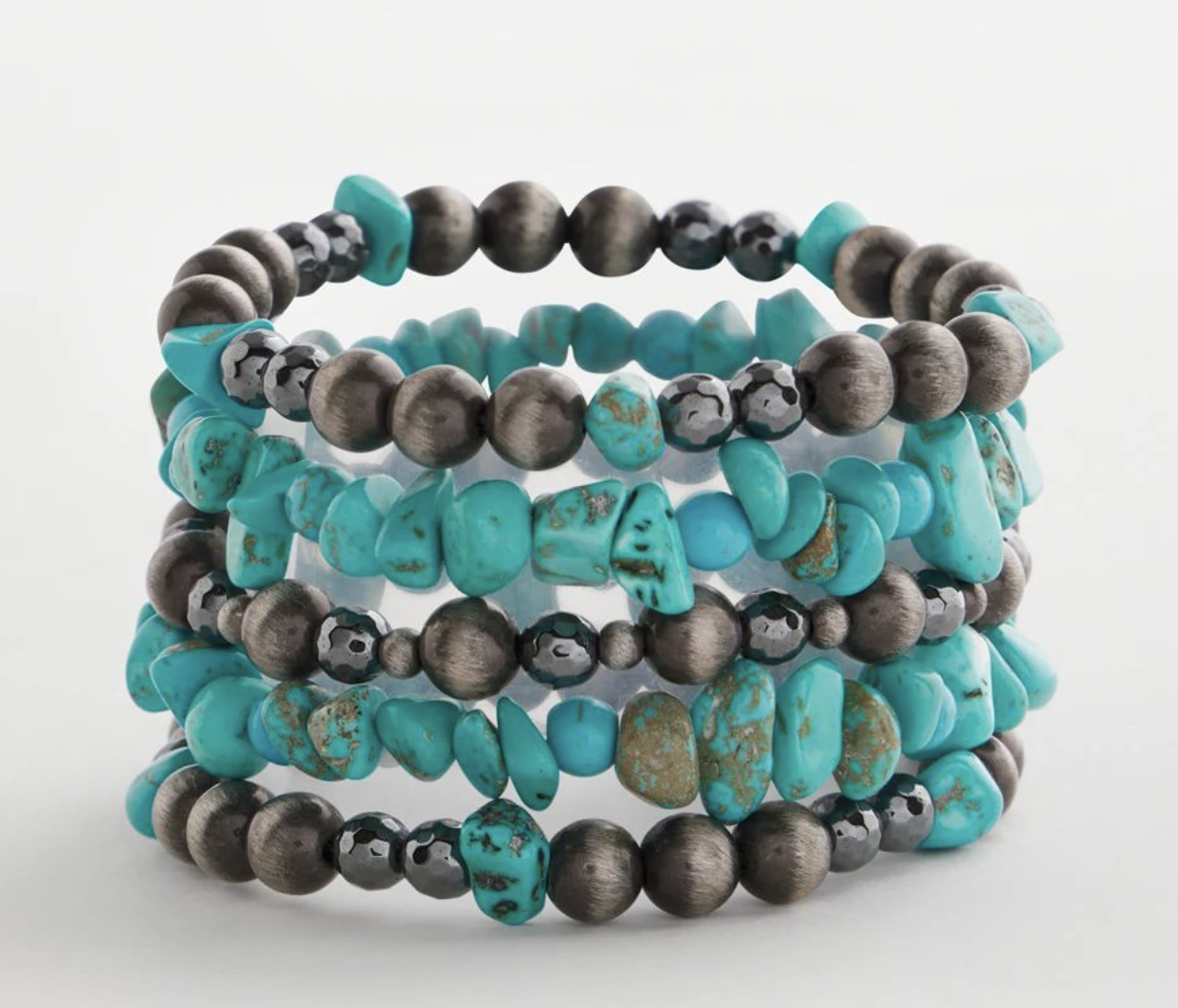 Chic and Timeless: Turquoise Jewelry Picks for Women Over 50 Tania Stephens 50 is not old fashion blogger  stackable bracelet