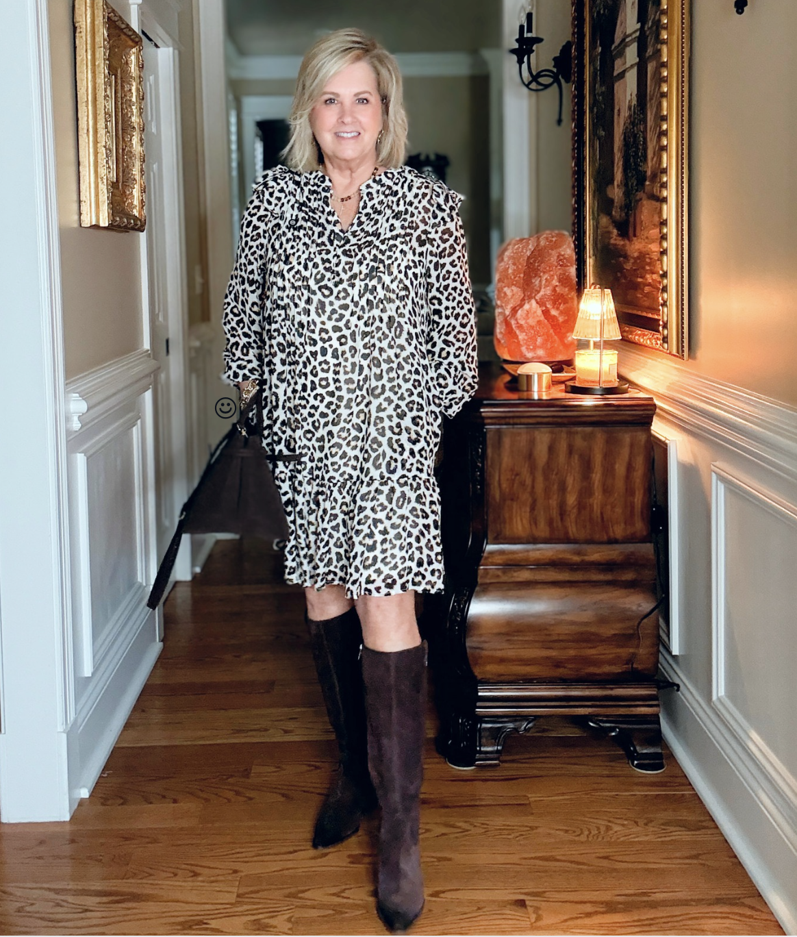 Tania, 5'6" tall, wearing a leopard print dress from Walmart