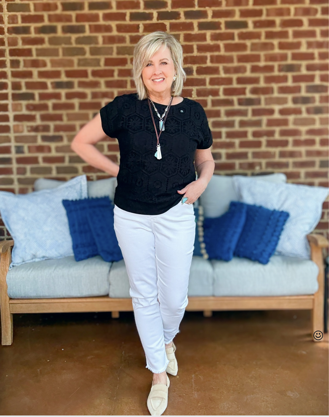Tania Stephens wearing fall styles from Chico's - a black crochet top with white jeans