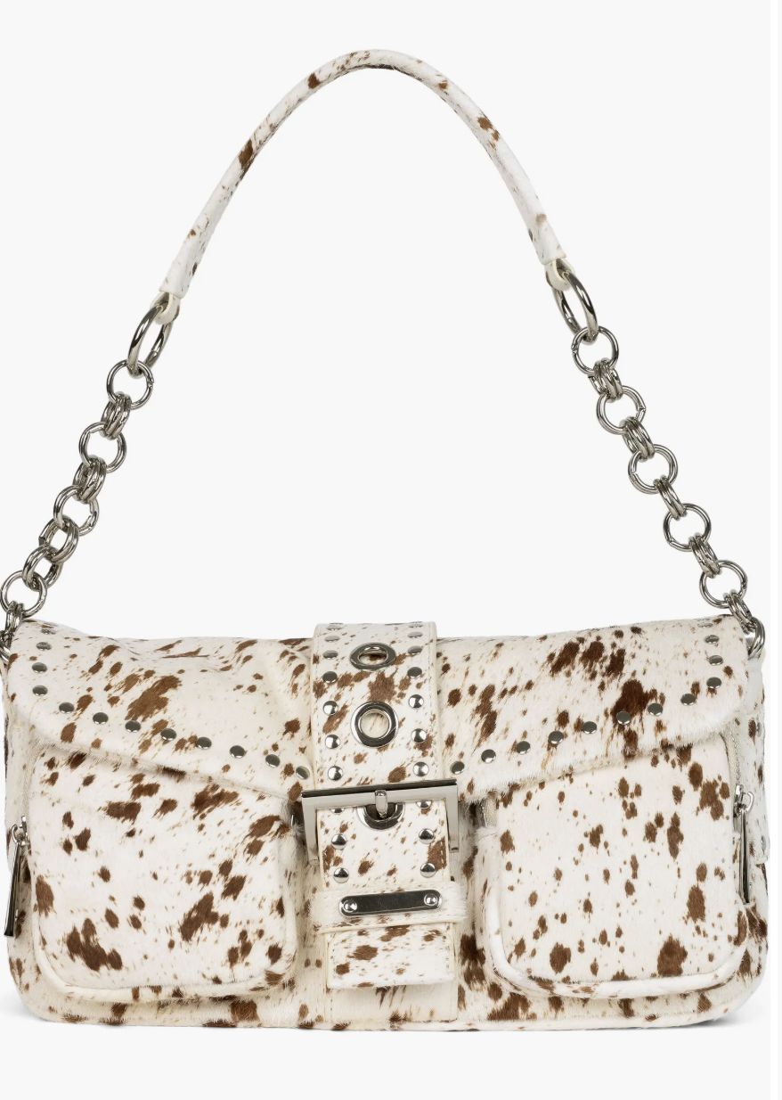 The Best Animal Print Purses for Women Over 50 tania stephens fashion blogger 50 is not old  cow print