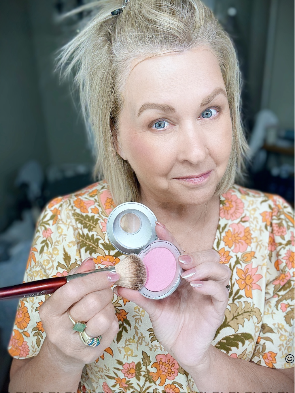 Tania using REM Beauty bright pink blush