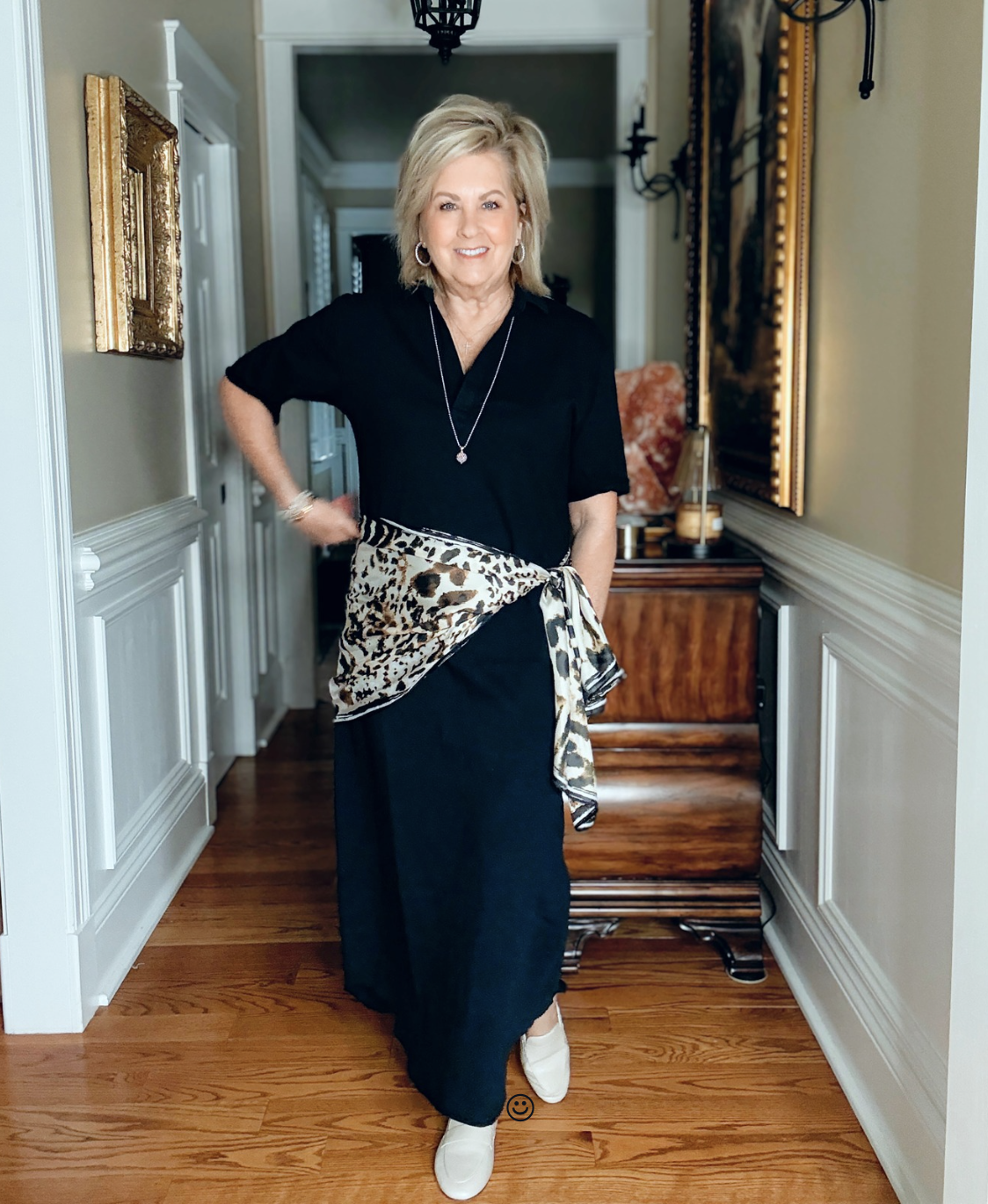 Classic maxi dress outfit for women over 50 updated with an animal print scarf tied at the waist for added pattern and style