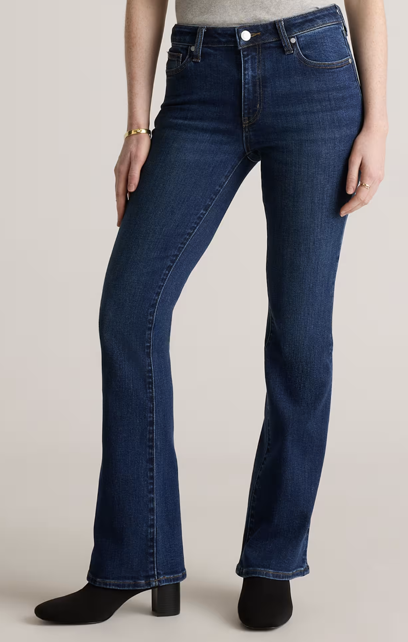 Best Dark Wash Jeans Every Woman Should Own tania stephens 50 is not old fashion blogger Dark indigo flare jeans styled with heeled ankle boots.