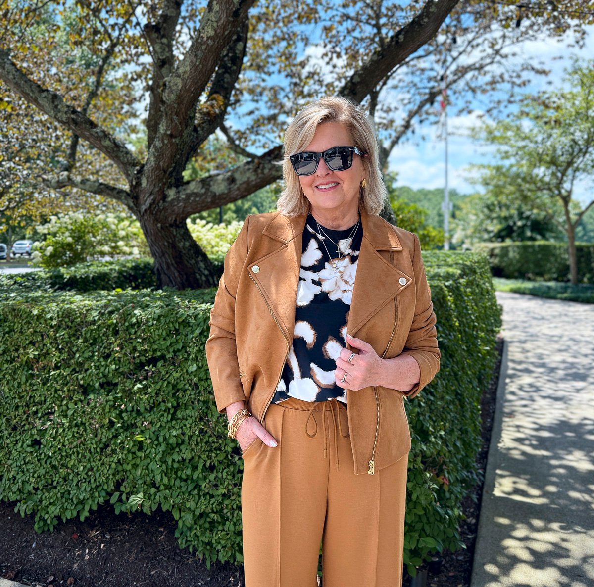 Faux suede moto jacket with wide-leg pants for stylish early fall outfit