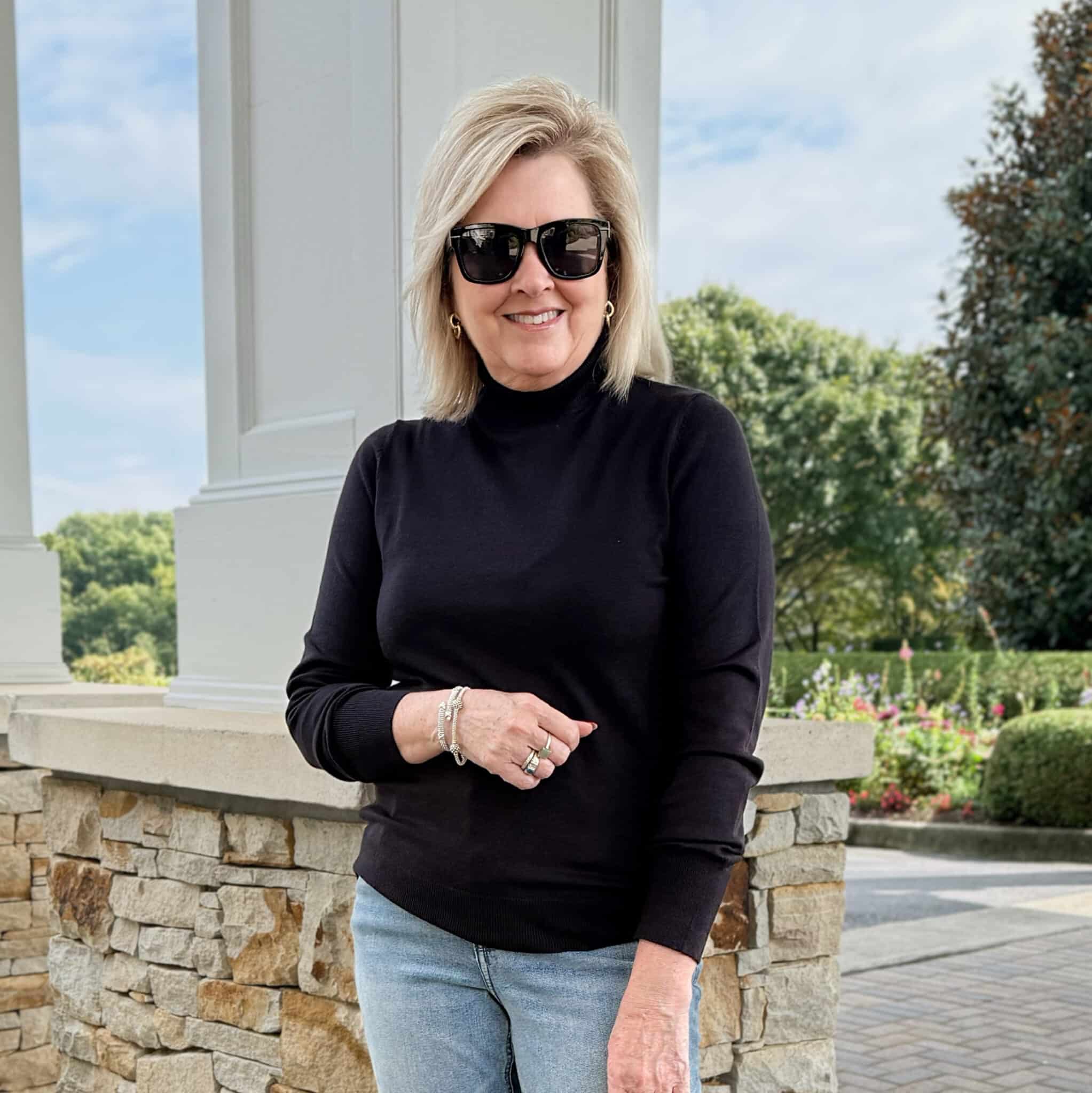 Tania wearing a black turtleneck from Kohl's