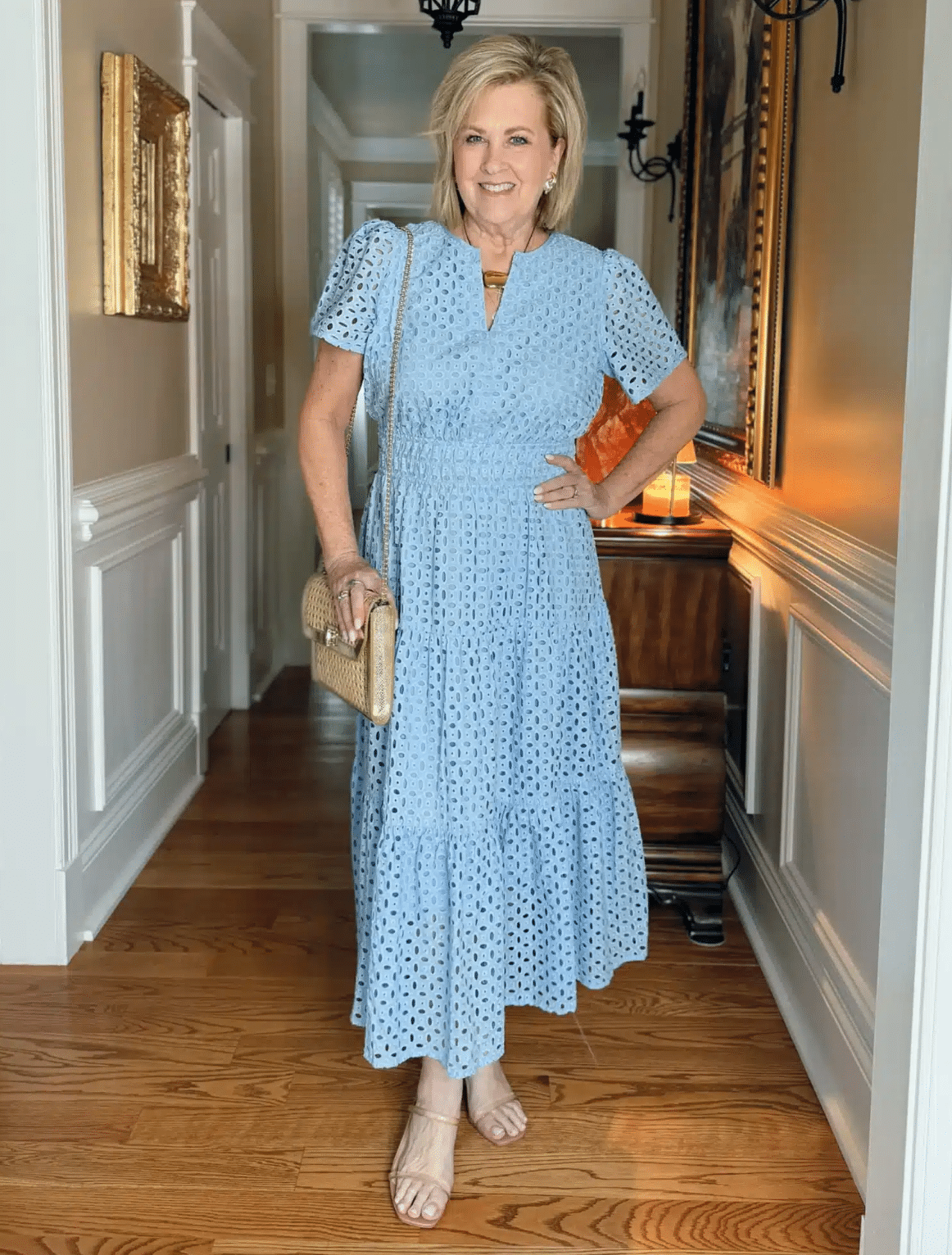 Tania Stephens wearing a long eyelet light blue dress from Amazon.