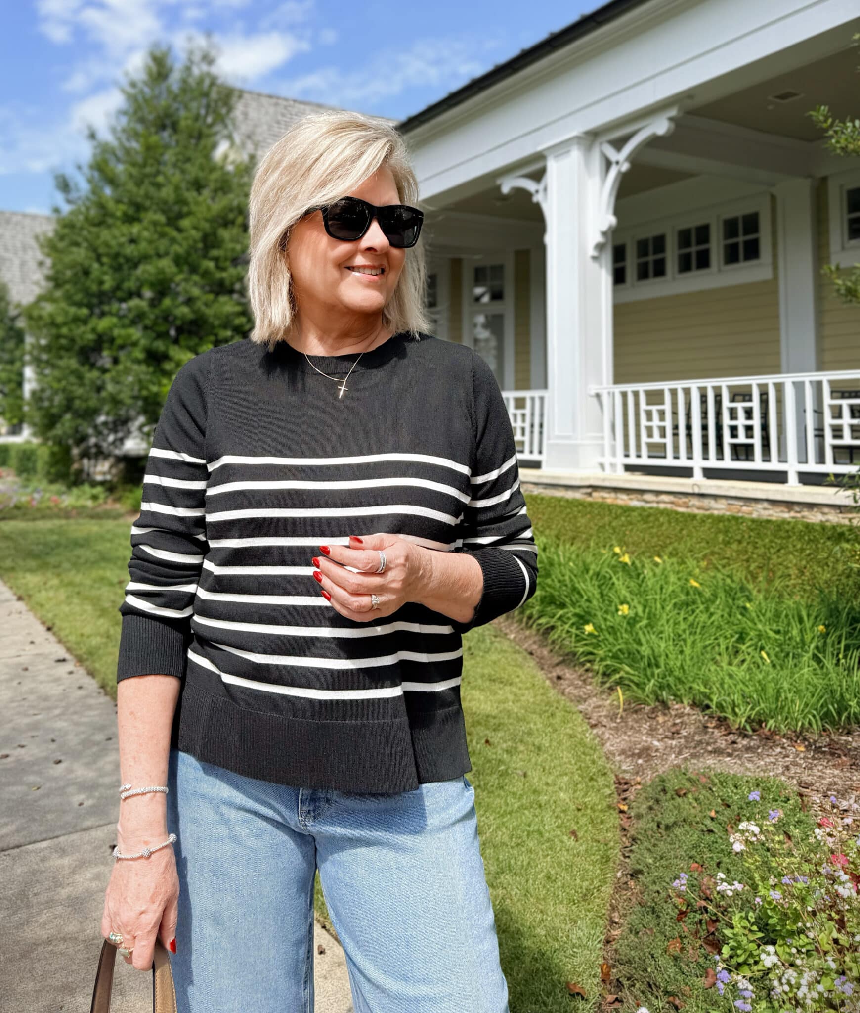 Tania Stephens wearing a Walmart black and white striped sweater