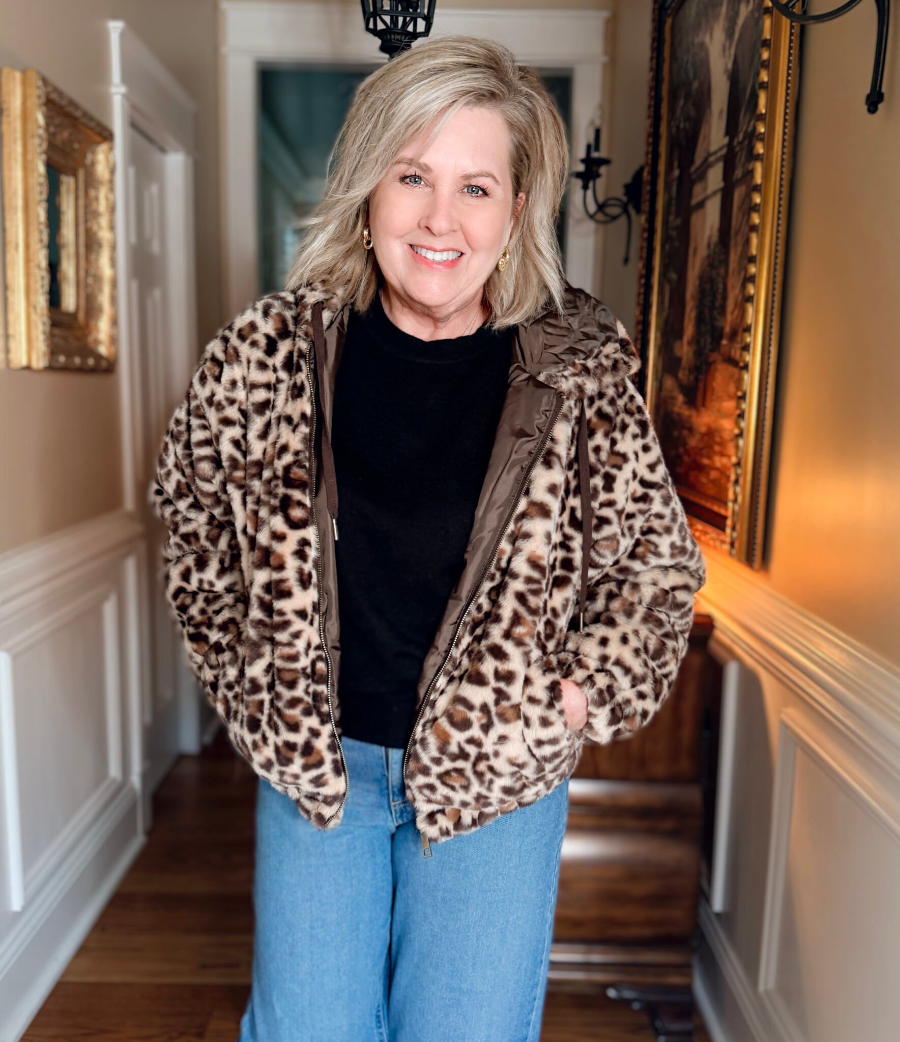 Tania wearing a Walmart plush leopard print coat