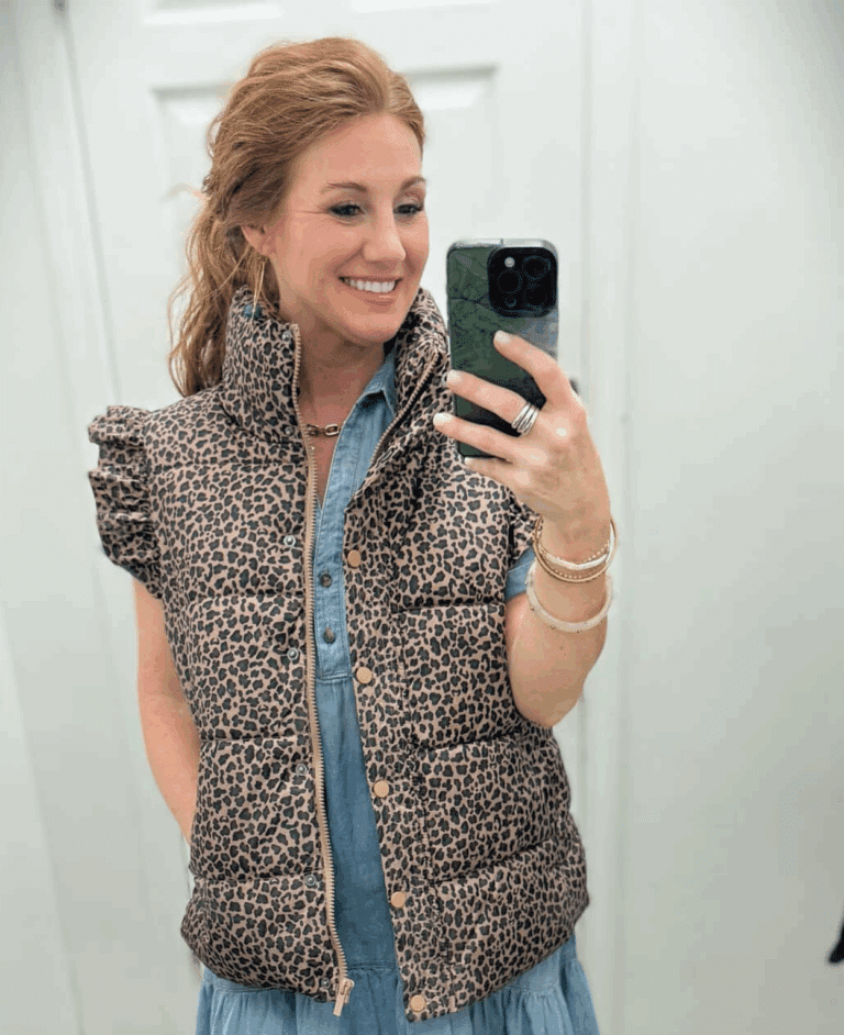 Stephanie wearing a cheetah print vest from Belk