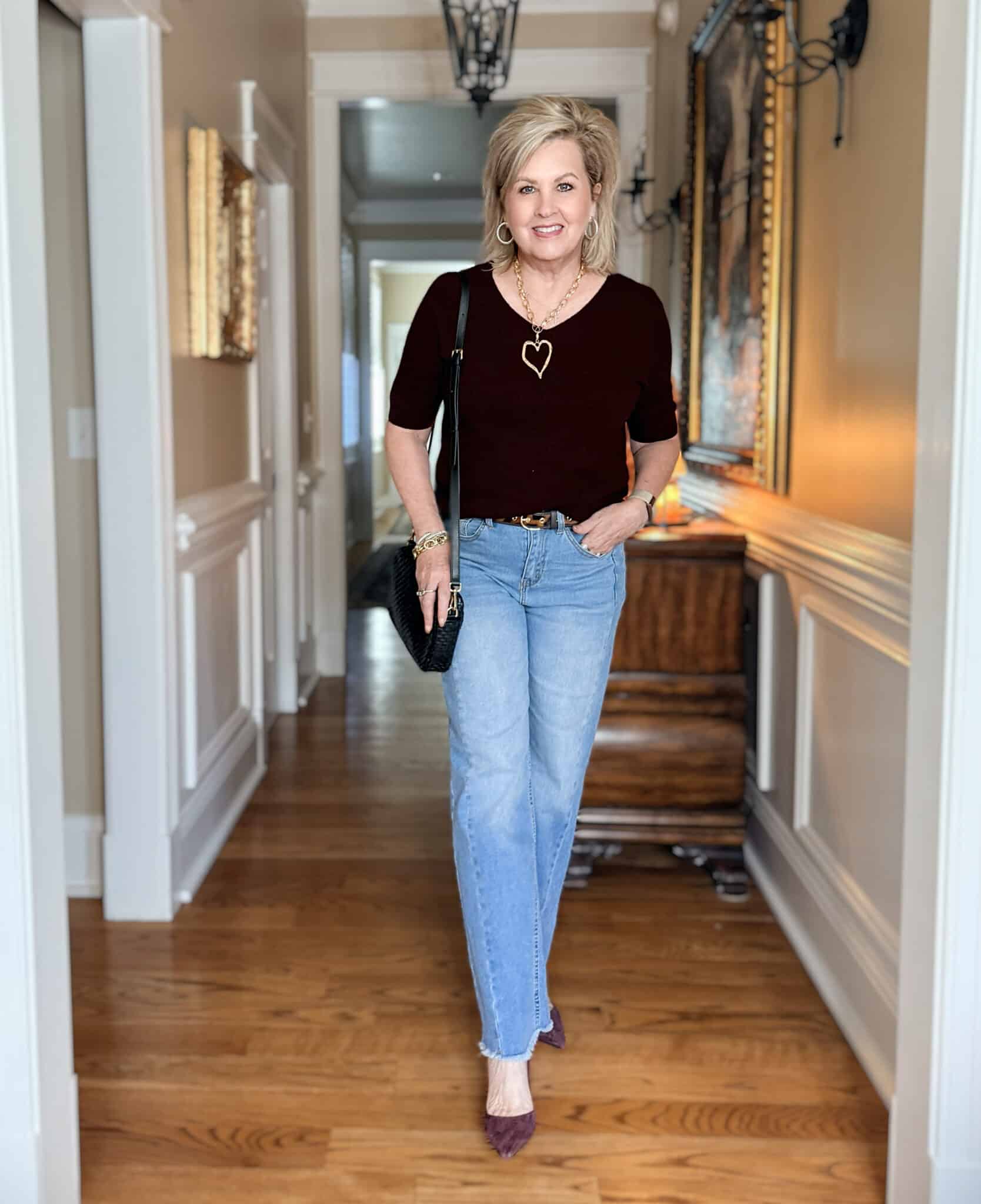 Tania wearing an Amazon wine sweater and Prettygarden jeans