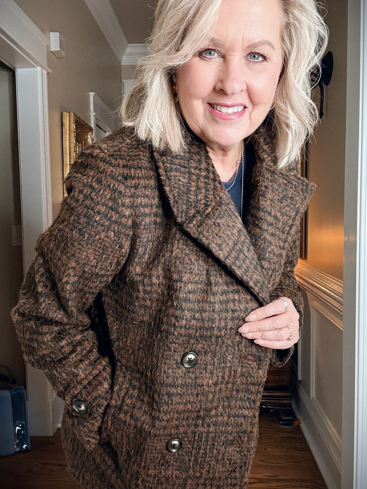 Close up of a Walmart Herringbone Plaid Peacoat jacket