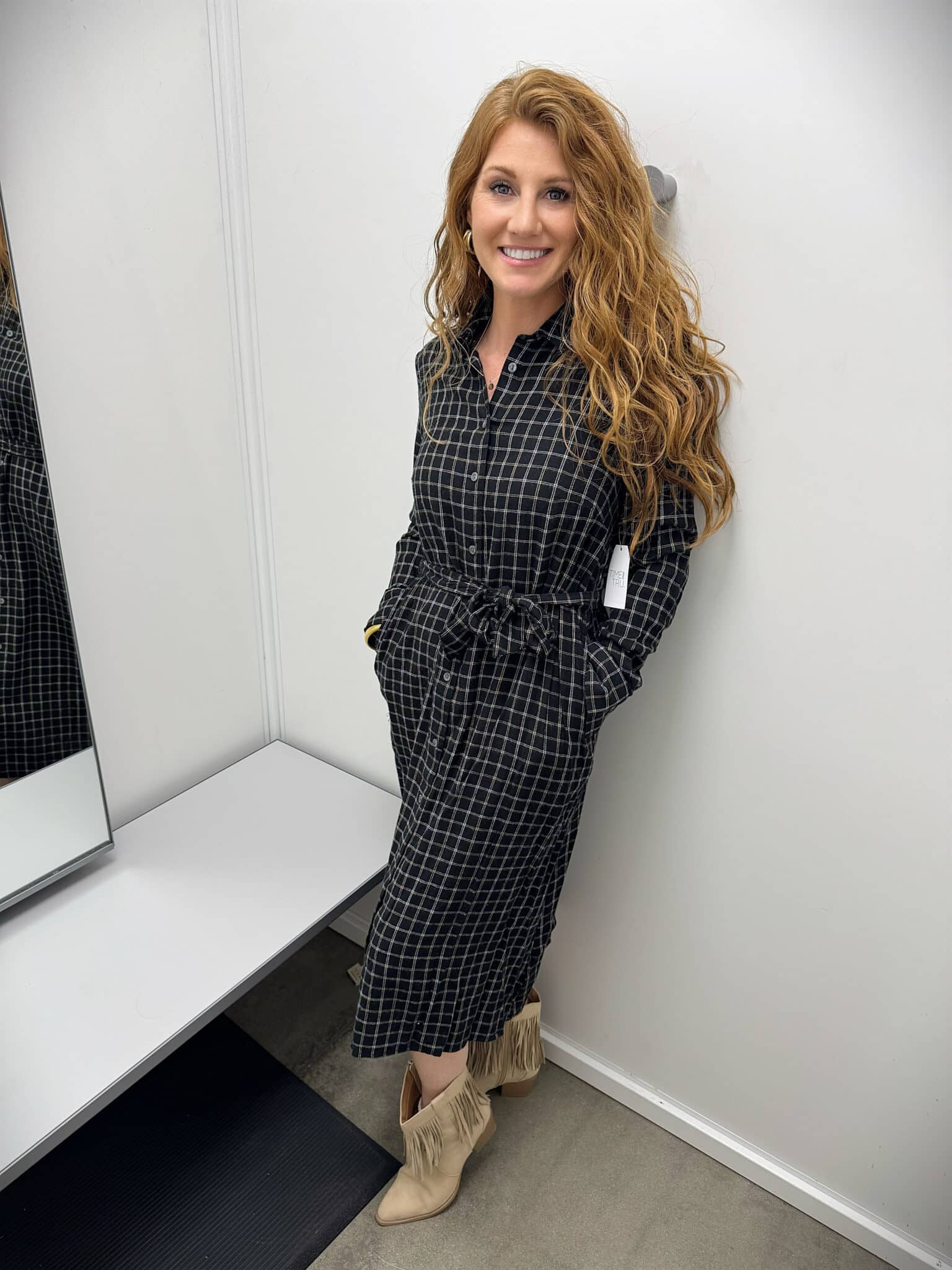 Stephanie wearing a plaid dress from Walmart