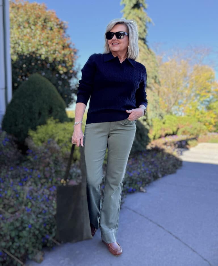 Tania wearing a navy sweater with olive jeans from Amazon
