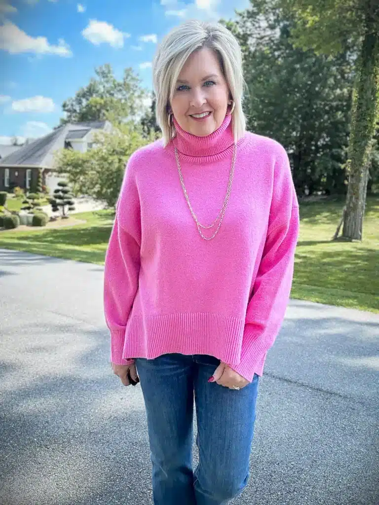 FASHION BLOGGER SHOWING WOMEN OVER 50 HOW TO STYLE PINK FOR FALL AND WINTER