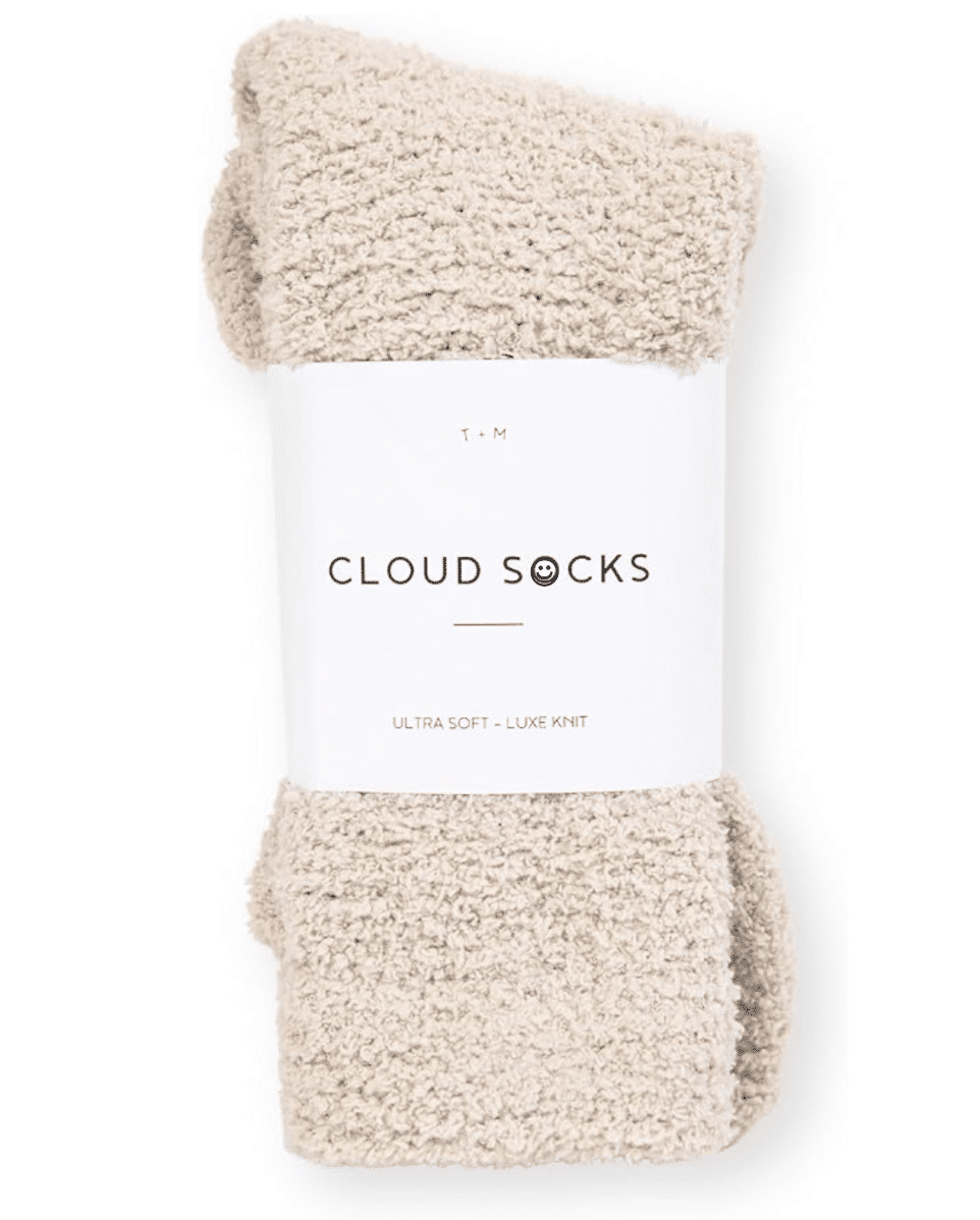 Ultra-soft cozy cloud socks folded on a blanket, perfect for keeping feet warm during a cozy night in.