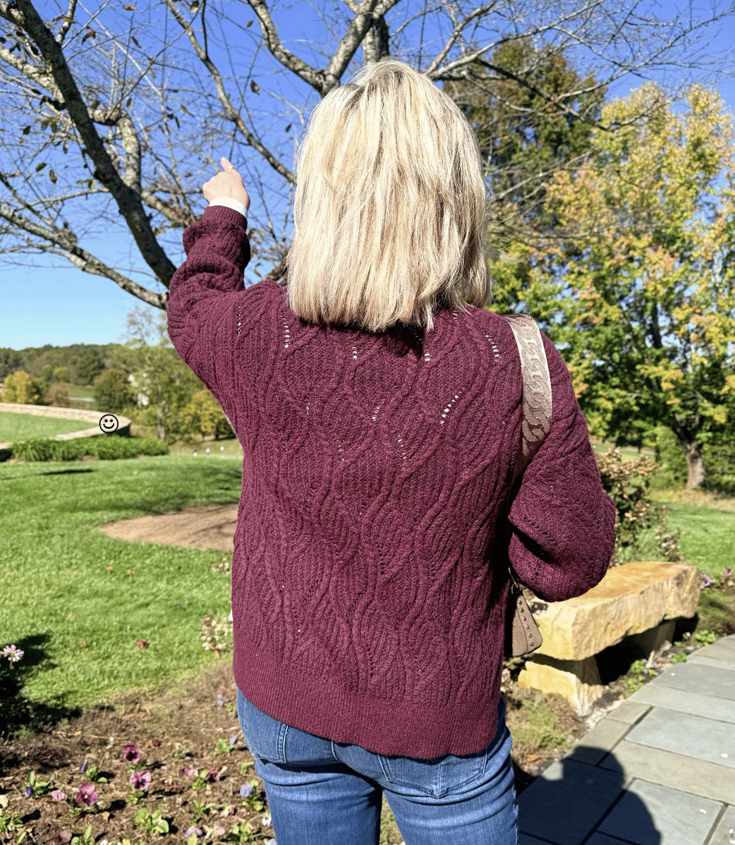 Nordstrom Rack pointing in a Poiintelle sweater