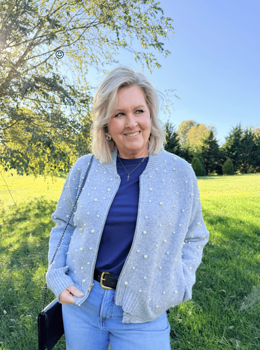 Tania Stephens wearing a Kohl's gray bomber jacket with pearl enhancements