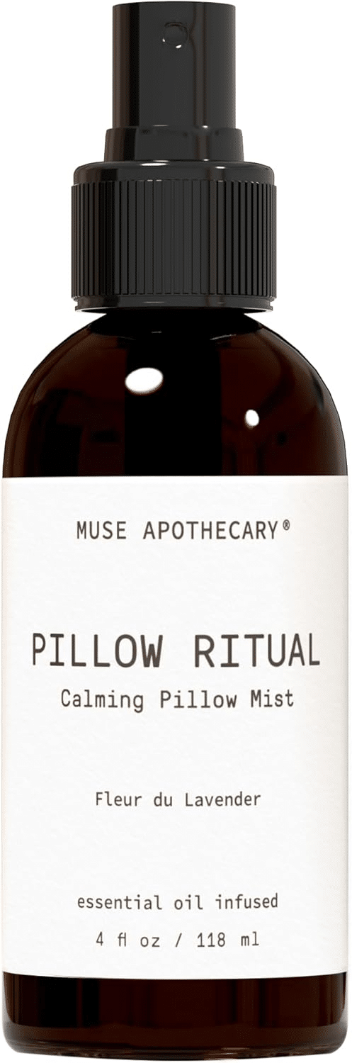 Lavender pillow spray bottle for nightstand, calming aromatherapy mist for a cozy bedtime routine.