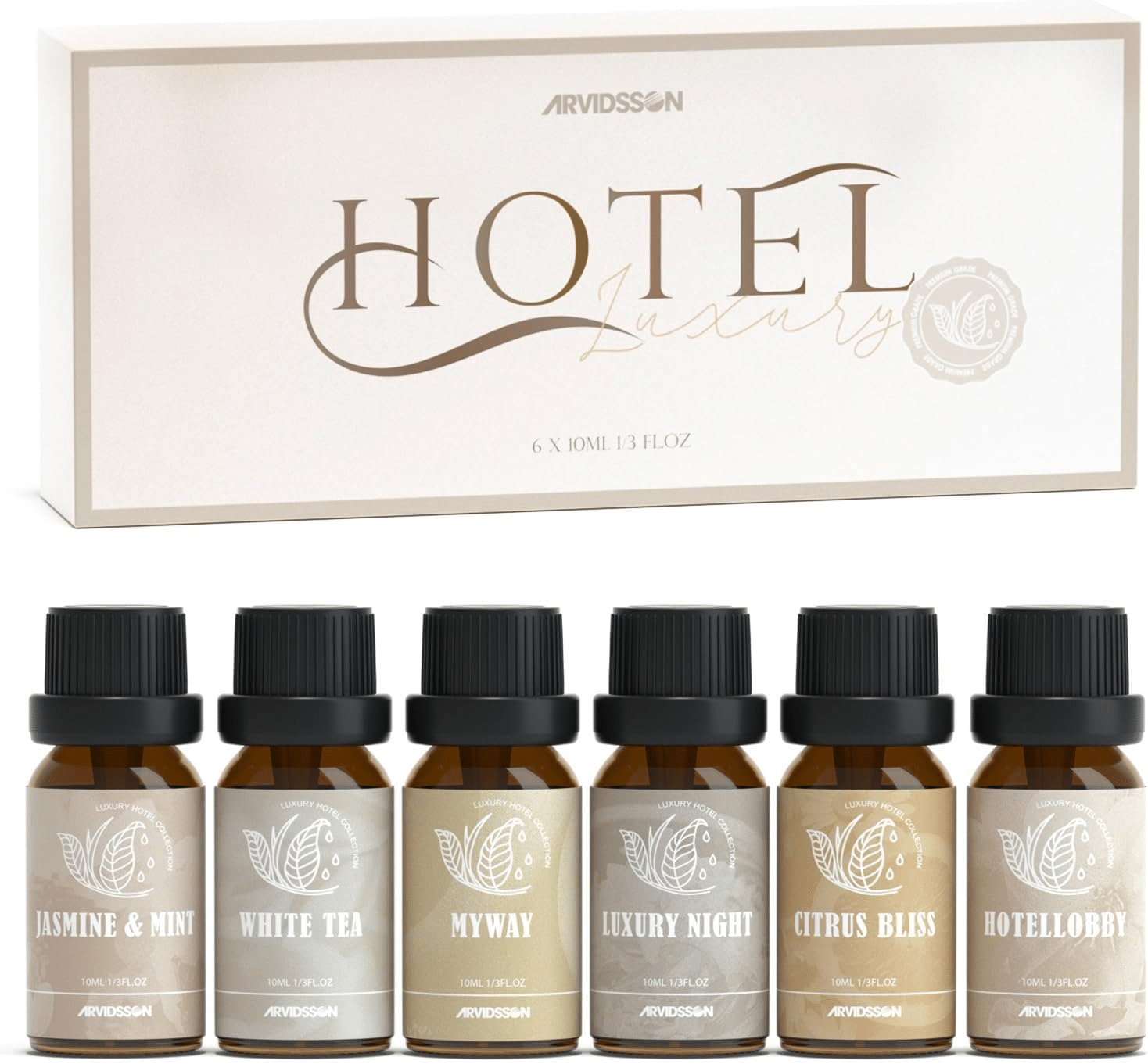 Luxury essential oil gift set with hotel-inspired scents, jasmine and white tea fragrances for a cozy home atmosphere.